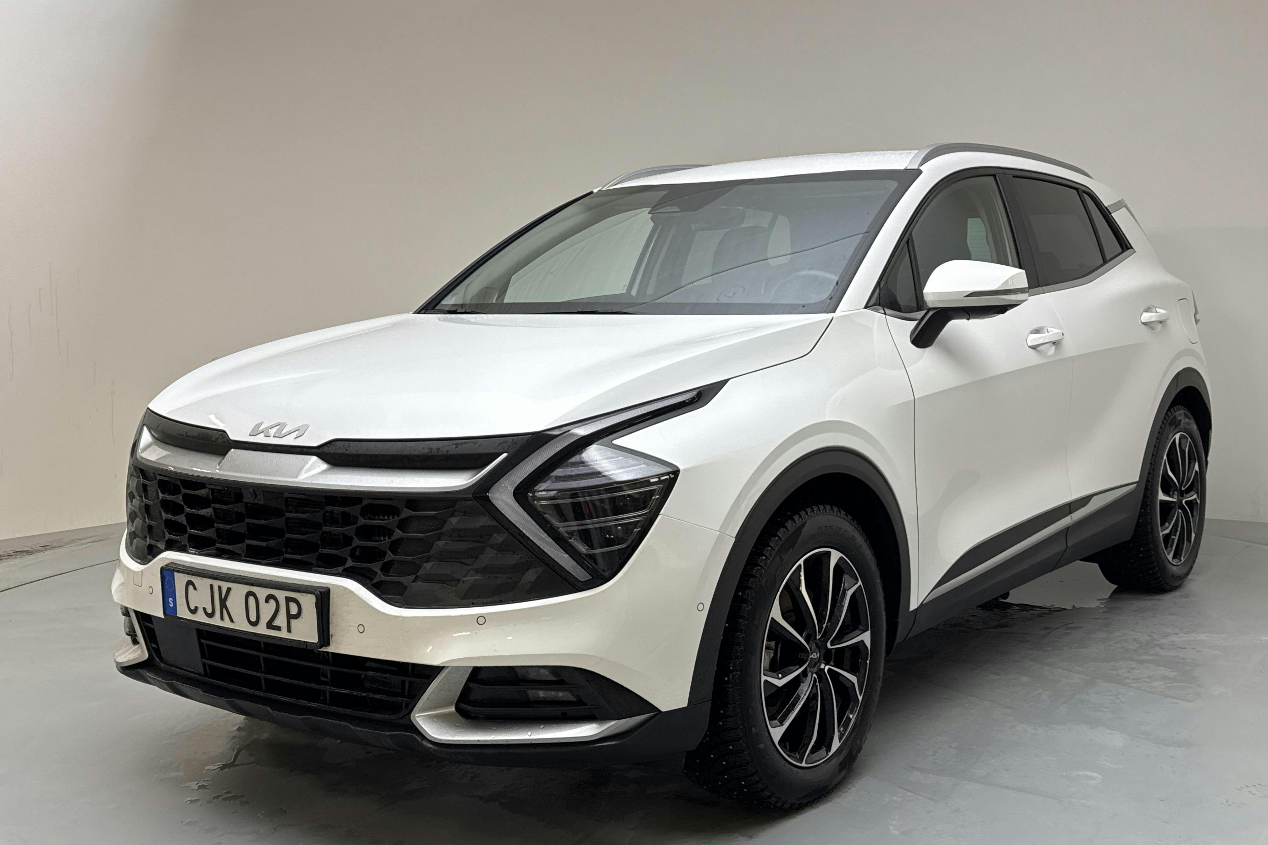 Presentation photo 1 of 14: KIA Sportage PHEV AWD (265hk) - 60 580 km - Automatic - white - 2025