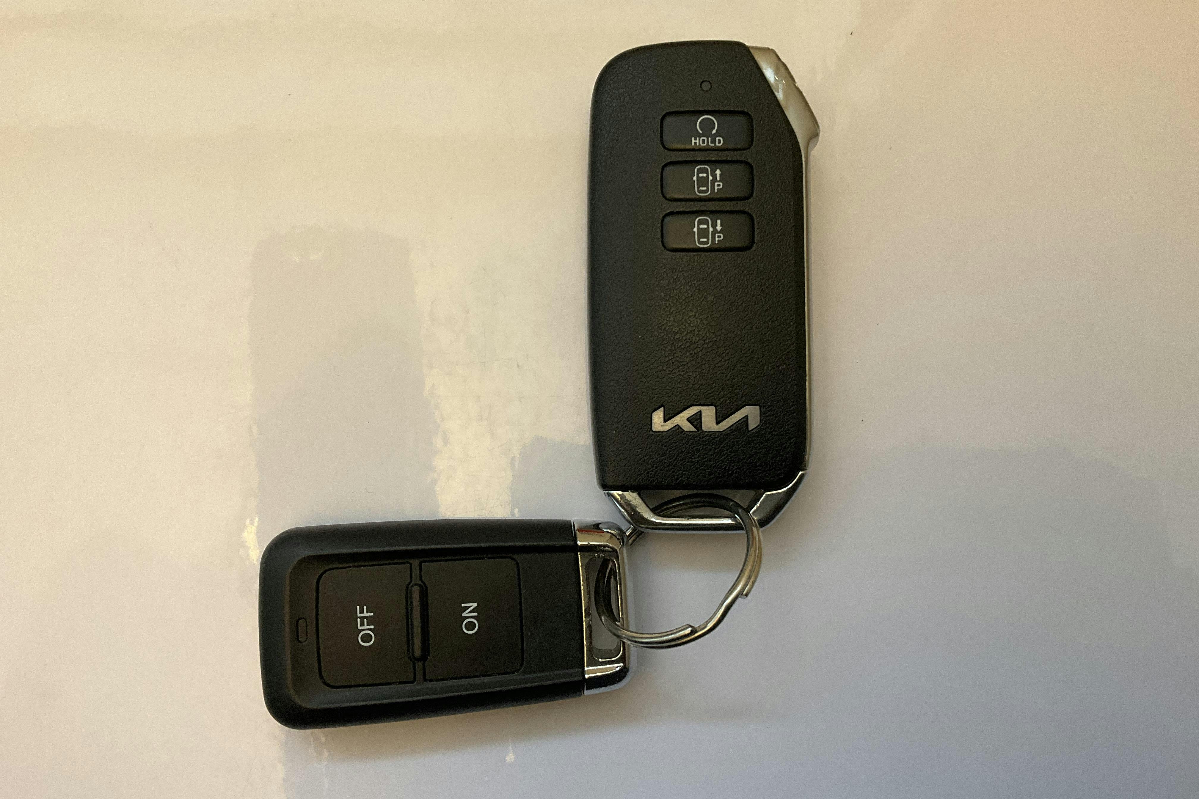 Presentation photo 14 of 14: KIA Sportage PHEV AWD (265hk) - 60 580 km - Automatic - white - 2025