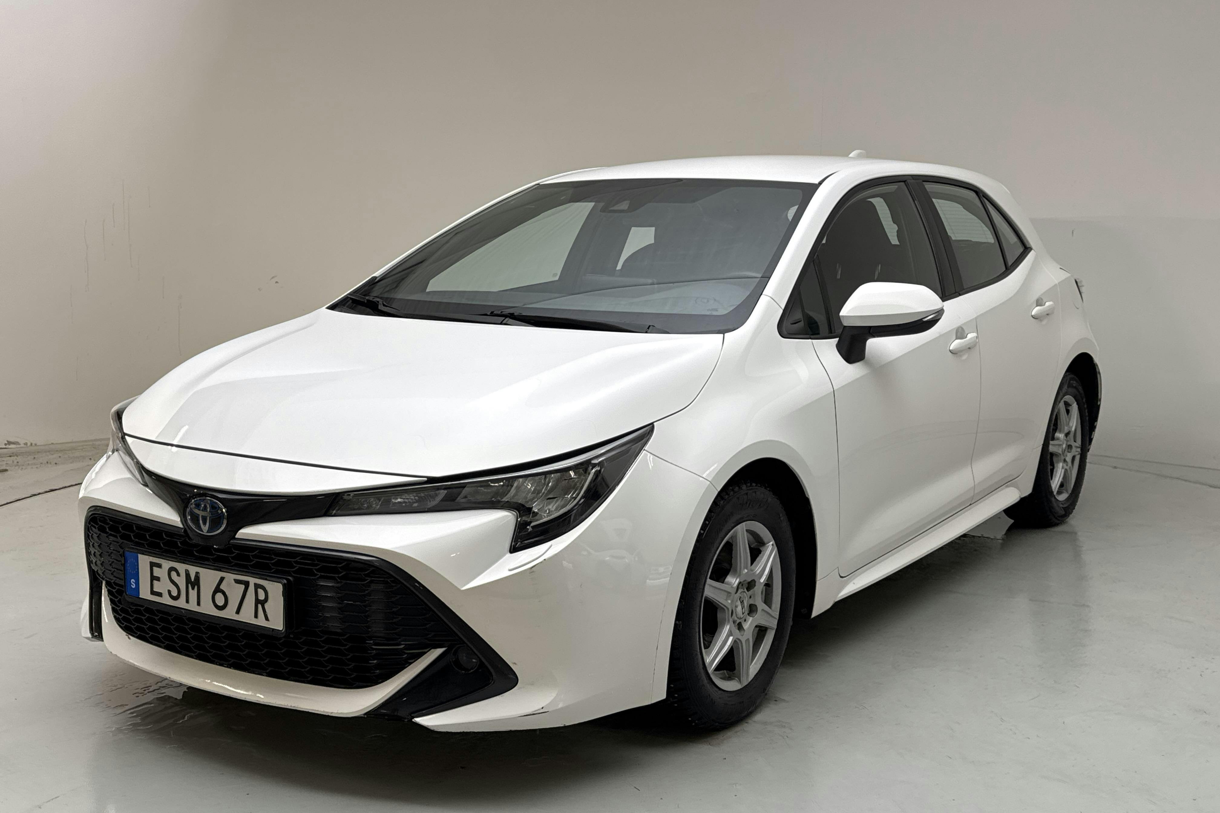 Presentation photo 1 of 14: Toyota Corolla 1.8 Hybrid 5dr (122hk) - 108 440 km - Automatic - white - 2022