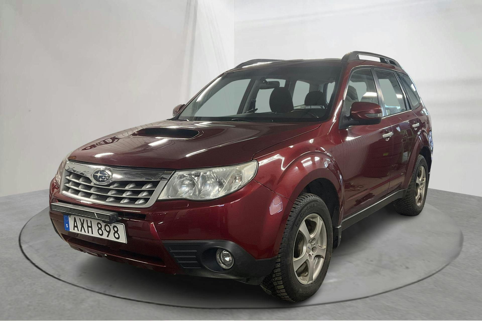 Presentation photo 1 of 16: Subaru Forester 2.0D (147hk) - 235 780 km - Manual - red - 2012