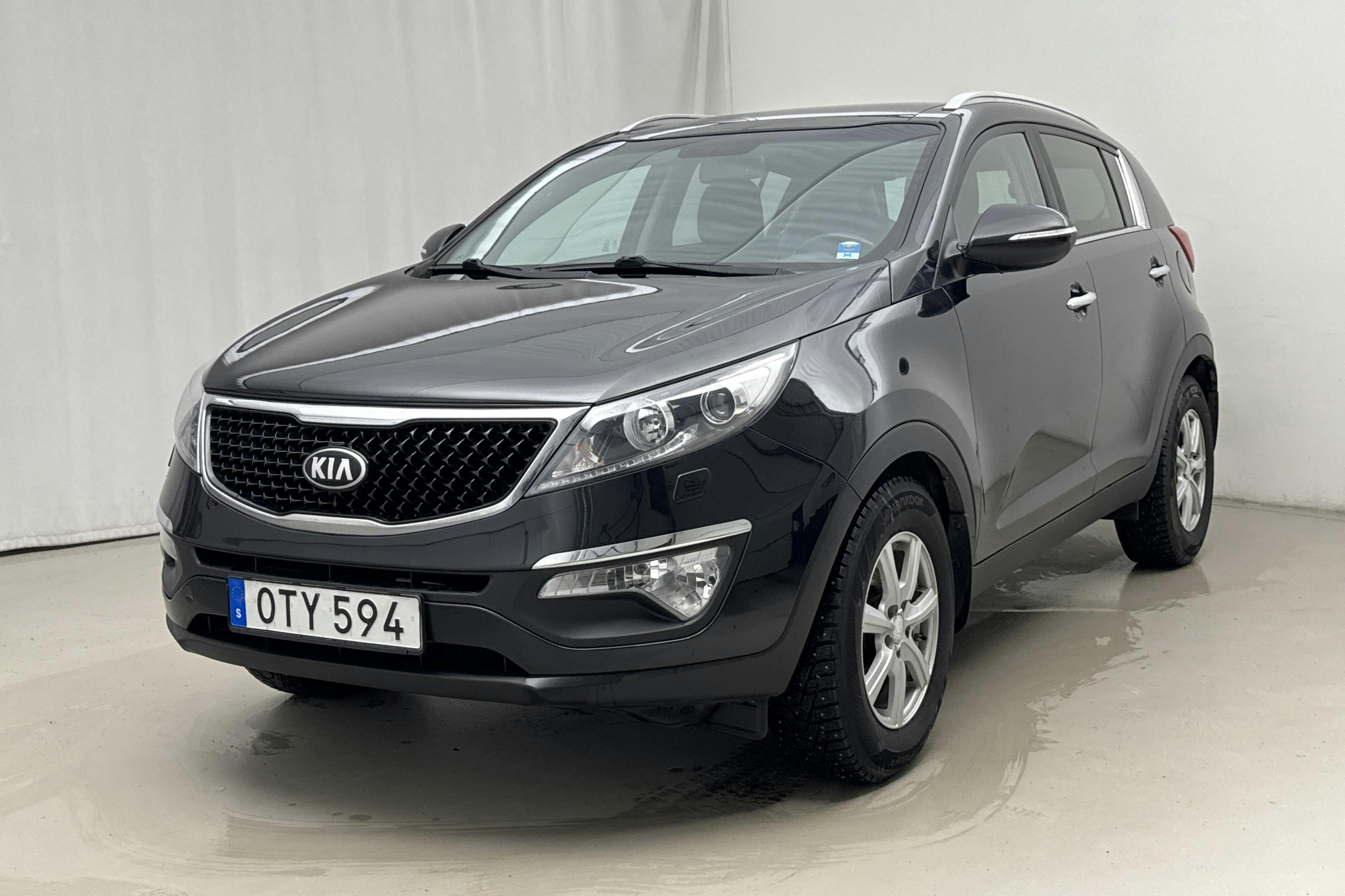 Presentation photo 1 of 18: KIA Sportage 1.7 CRDi 2WD (115hk) - 160 140 km - Manual - black - 2014