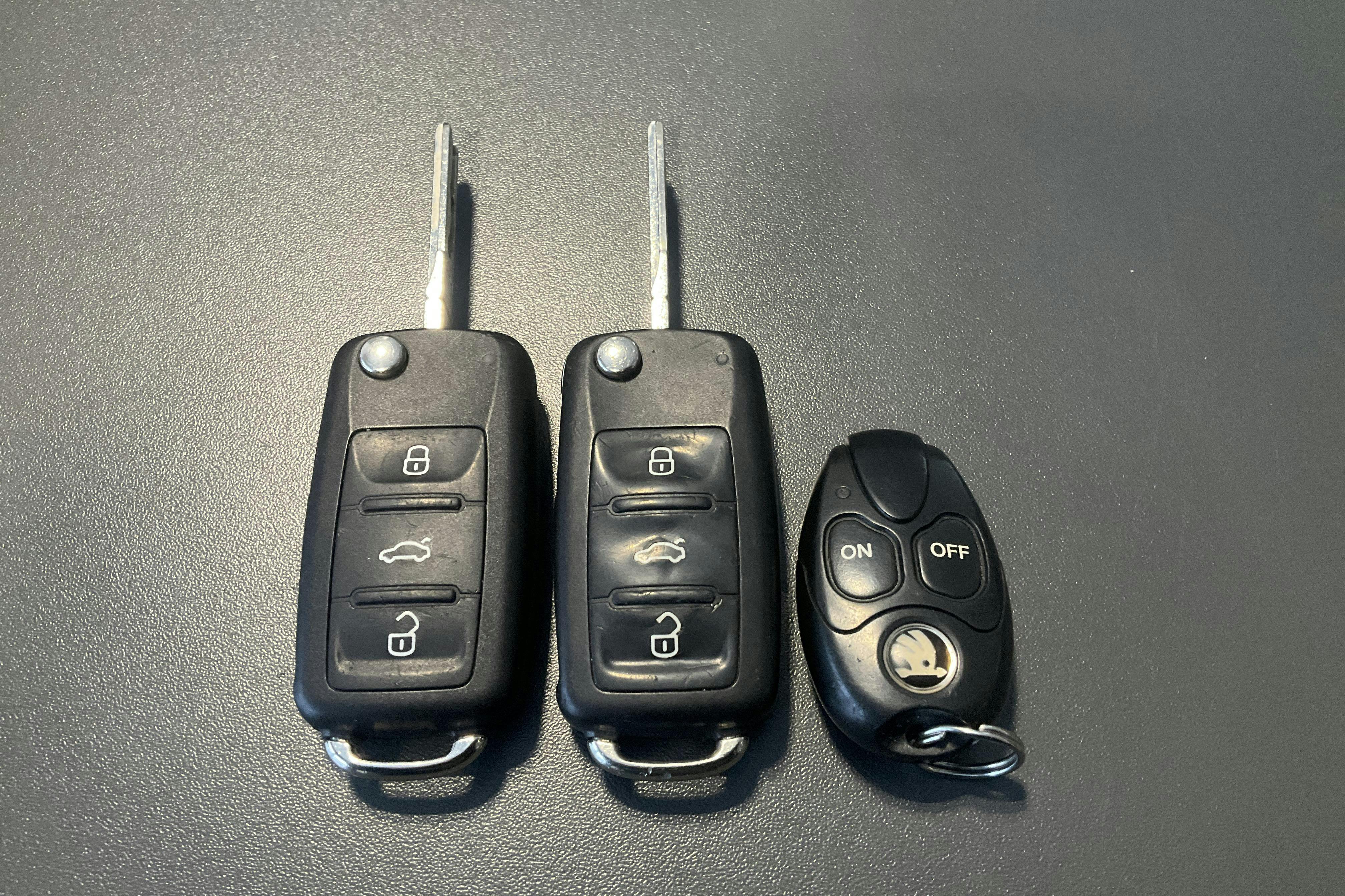 Presentation photo 16 of 16: Skoda Superb 2.0 TDI Kombi (140hk) - 159 240 km - Automatic - Light Brown - 2015