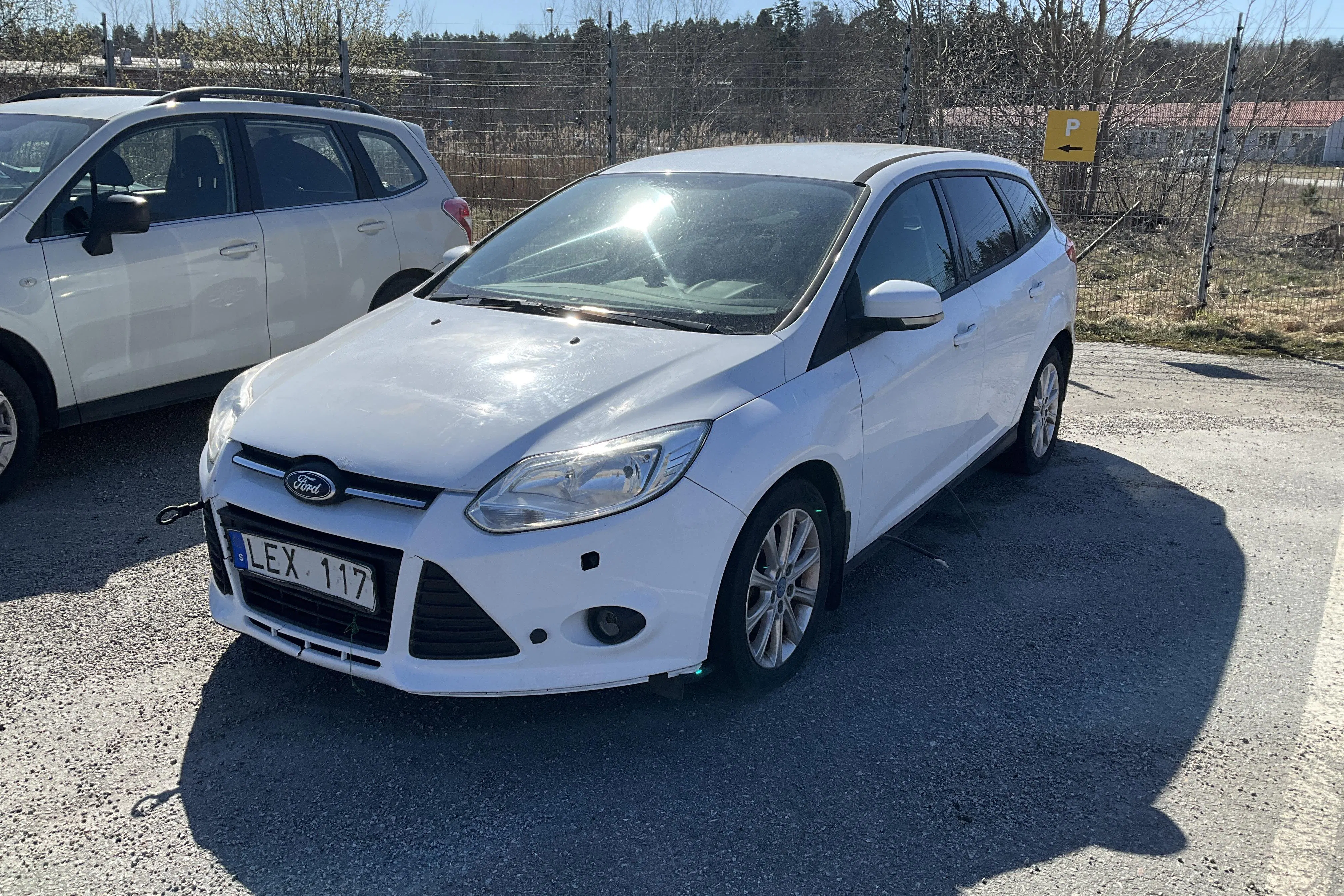 Presentationsfoto 1 av 12: Ford Focus 1.6 TDCi Kombi (95hk) - 20 649 mil - Manuell - vit - 2012