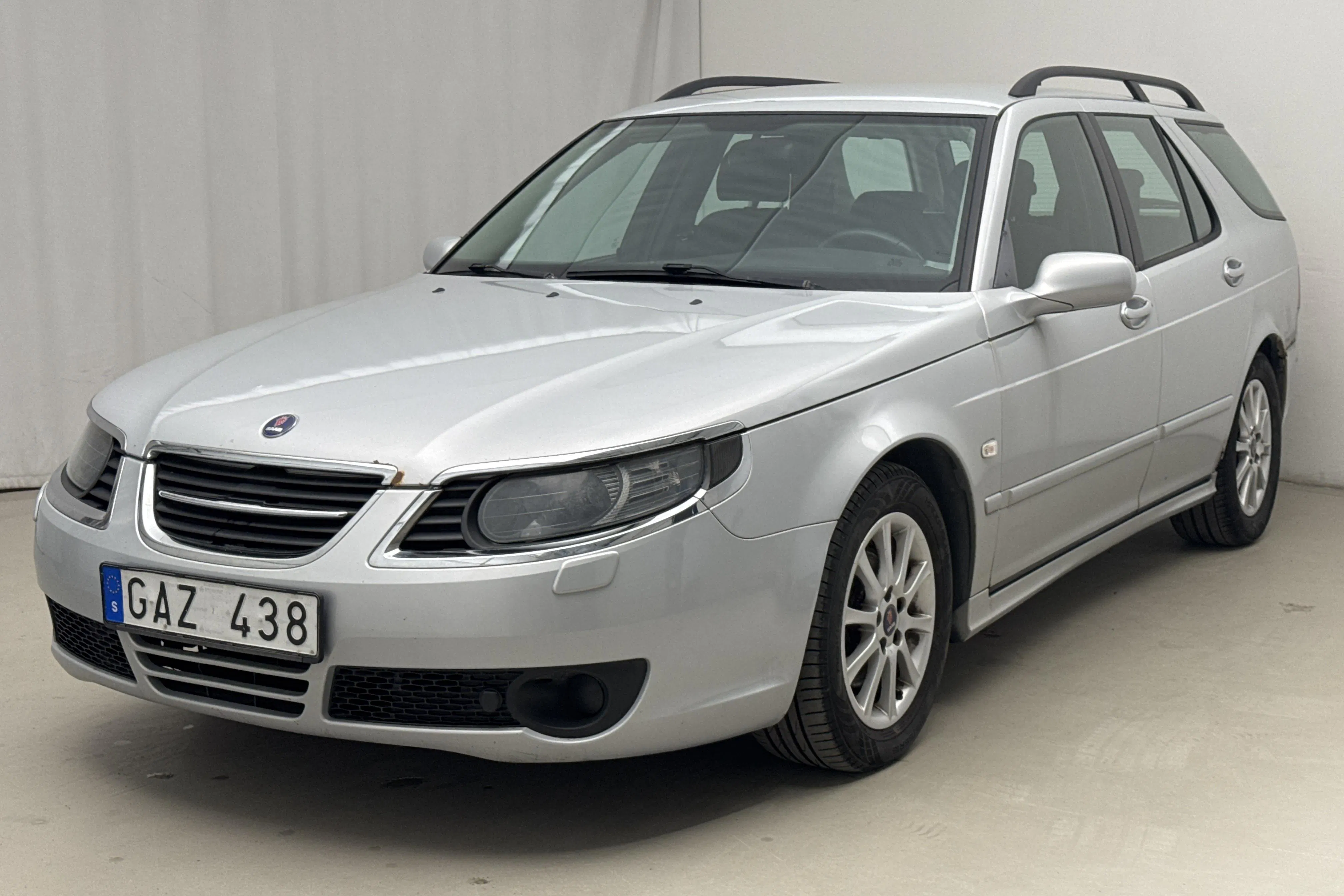 Presentation photo 1 of 12: Saab 9-5 2.0t Biopower SportCombi (150hk) - 262 510 km - Manual - Light Grey - 2008
