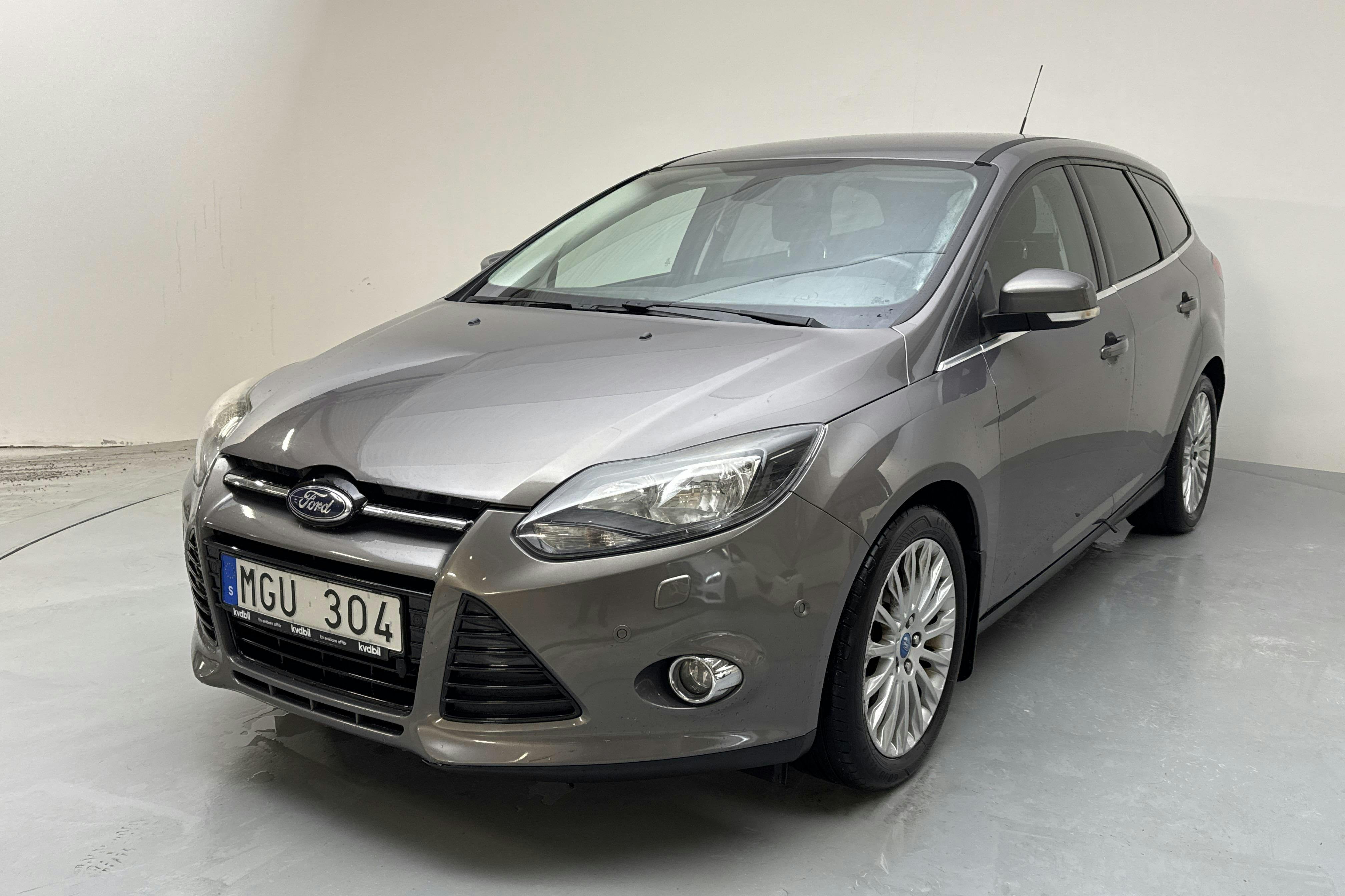 Presentation photo 1 of 11: Ford Focus 1.0 EcoBoost Kombi (125hk) - 156 610 km - Manual - brown - 2013