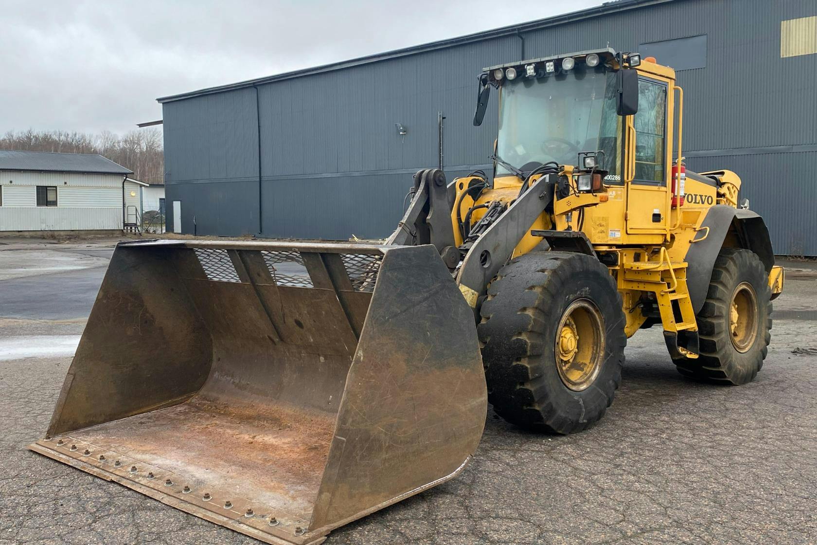 Presentation photo 1 of 79: Volvo L60E Hjullastare - 0 km - 2005