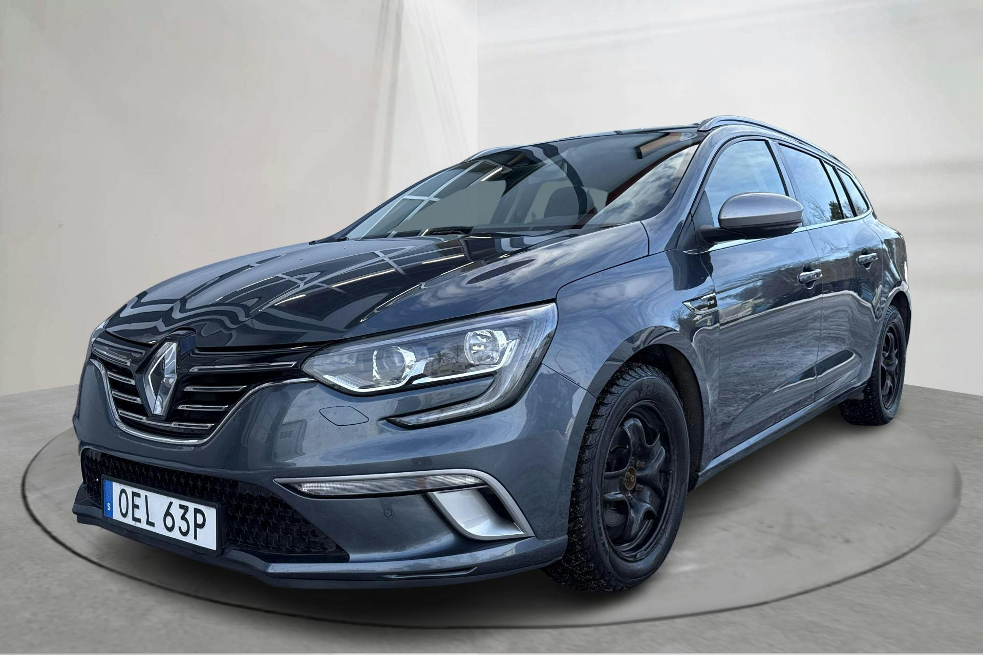 Presentationsfoto 1 av 19: Renault Mégane 1.3 TCe Sport Tourer (115hk) - 9 969 mil - Manuell - grå - 2020