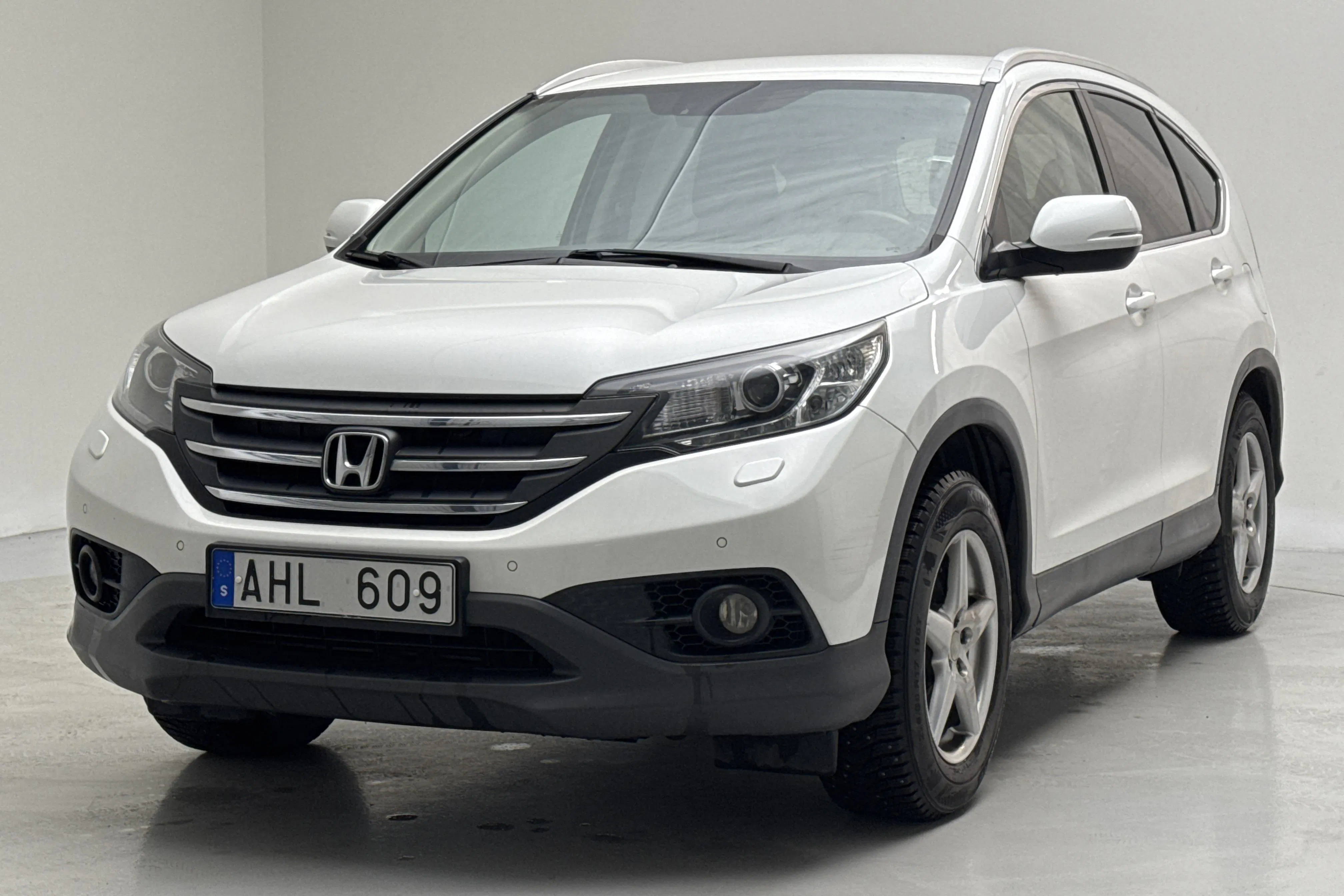 Presentation photo 1 of 13: Honda CR-V 2.2 i-DTEC 4WD (150hk) - 208 280 km - Automatic - white - 2014