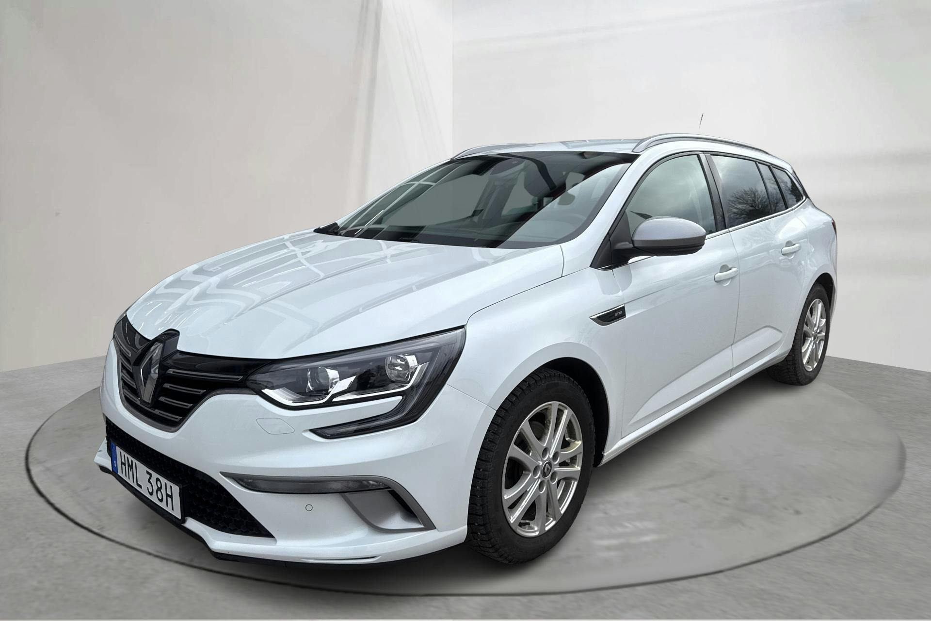 Presentation photo 1 of 18: Renault Mégane 1.3 TCe Sport Tourer (140hk) - 73 750 km - Automatic - white - 2020