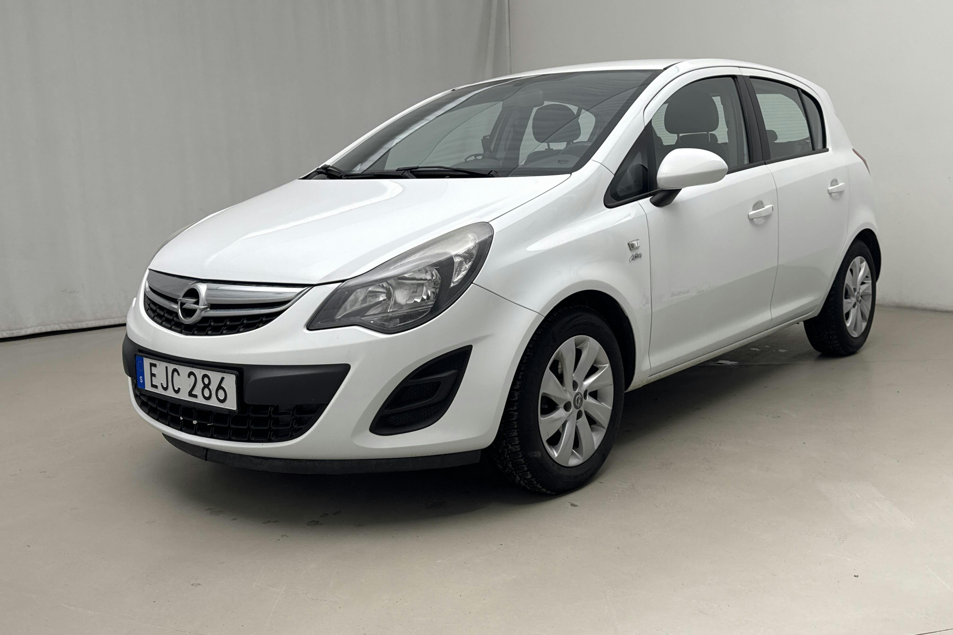 Präsentationsfoto 1 von 11: Opel Corsa 1.2 Twinport 5dr (85hk) - 142 570 Kilometer - Handbuch - Weiß - 2014