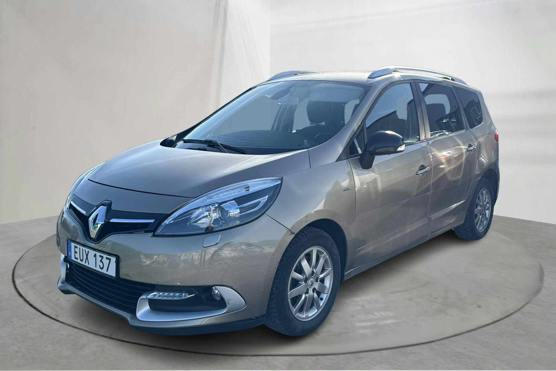 Presentationsfoto 1 av 15: Renault Grand Scénic III 1.5 dCi ESM (110hk) - 17 846 mil - Manuell - Light Brown - 2015