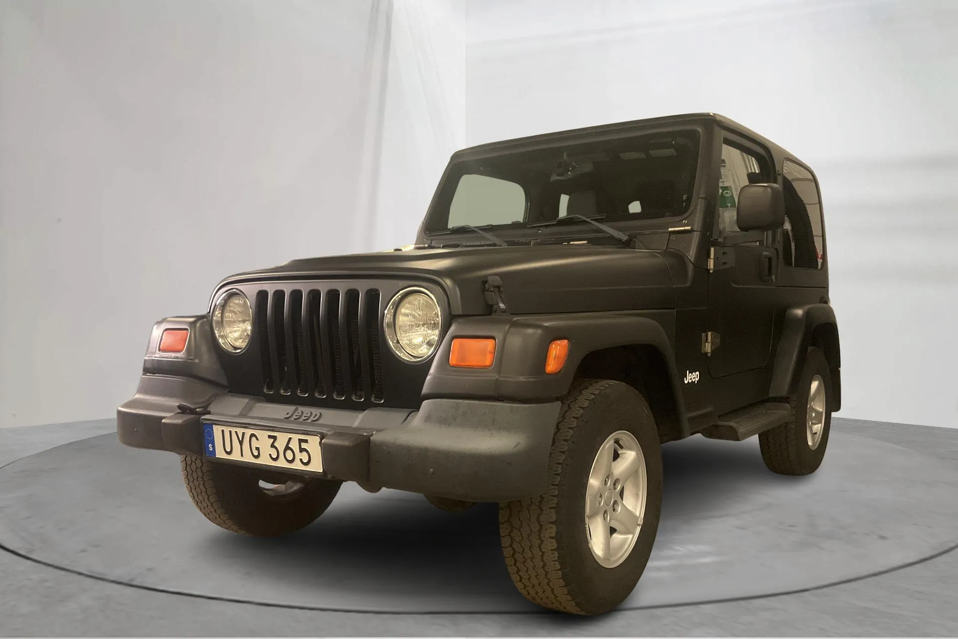 Presentation photo 1 of 13: Jeep Wrangler 4.0 Sahara (177hk) - 156 830 km - Automatic - black - 2004