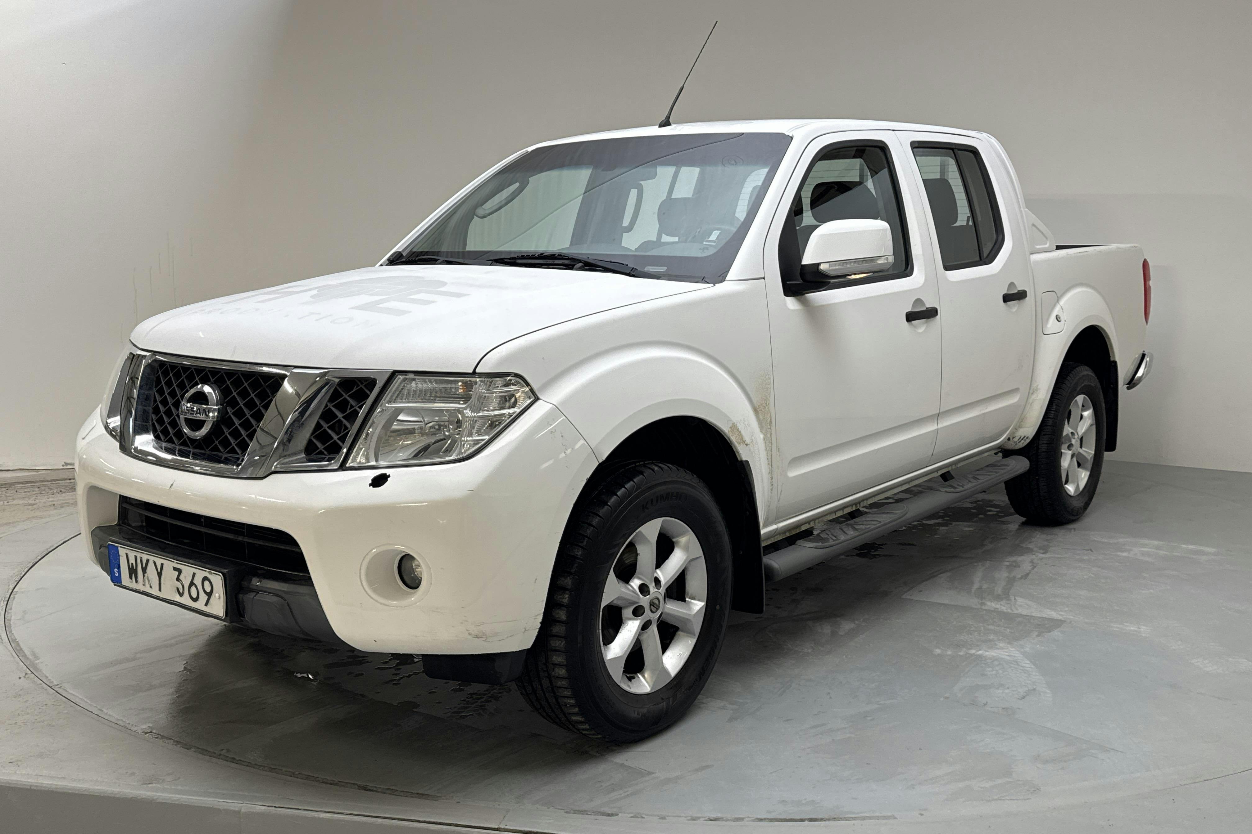 Presentationsfoto 1 av 15: Nissan Navara 2.5 dCi (144hk) - 12 275 mil - Manuell - vit - 2014