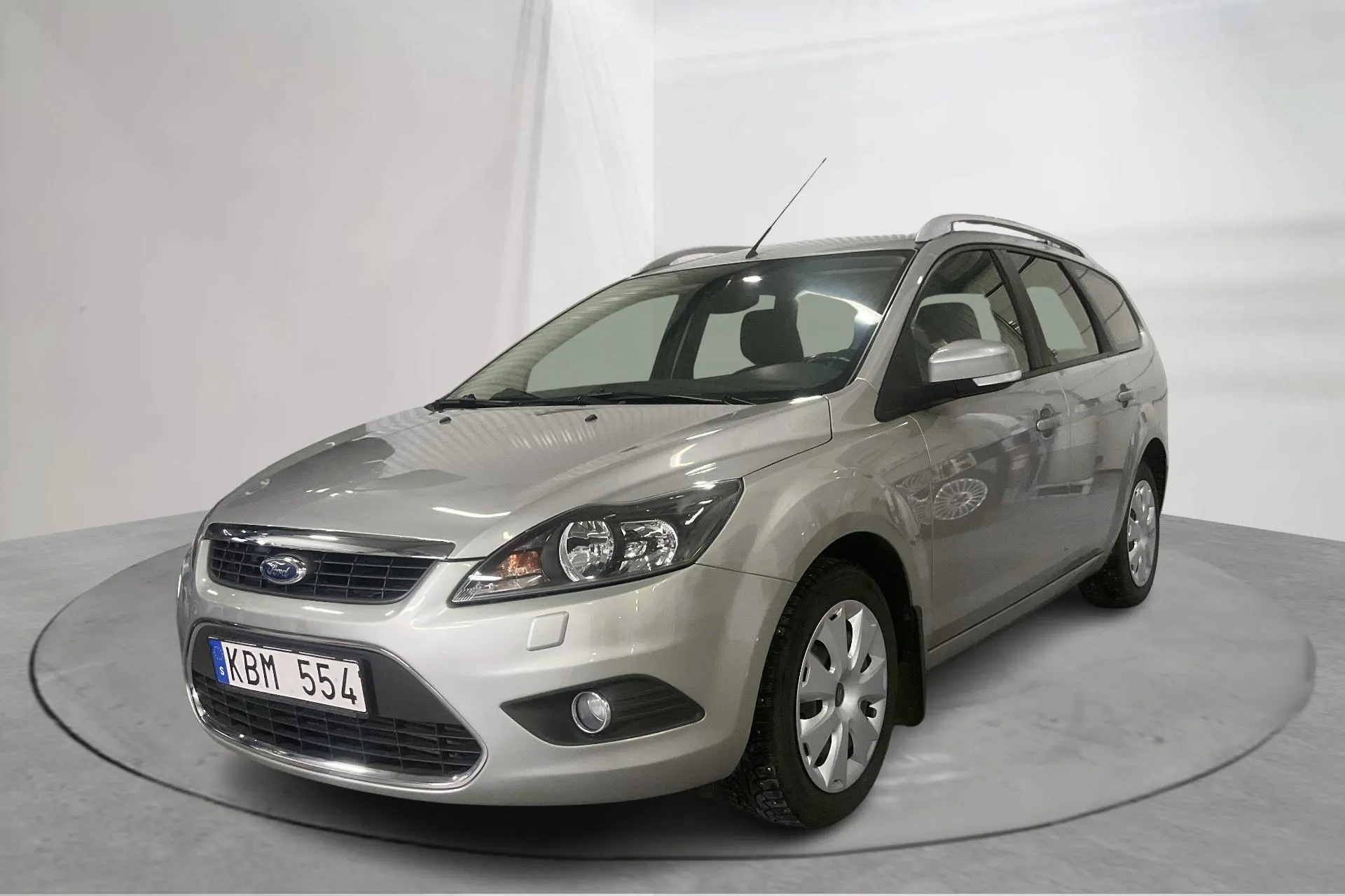 Presentation photo 1 of 14: Ford Focus 1.6 TDCi Kombi (109hk) - 128 980 km - Manual - gray - 2010