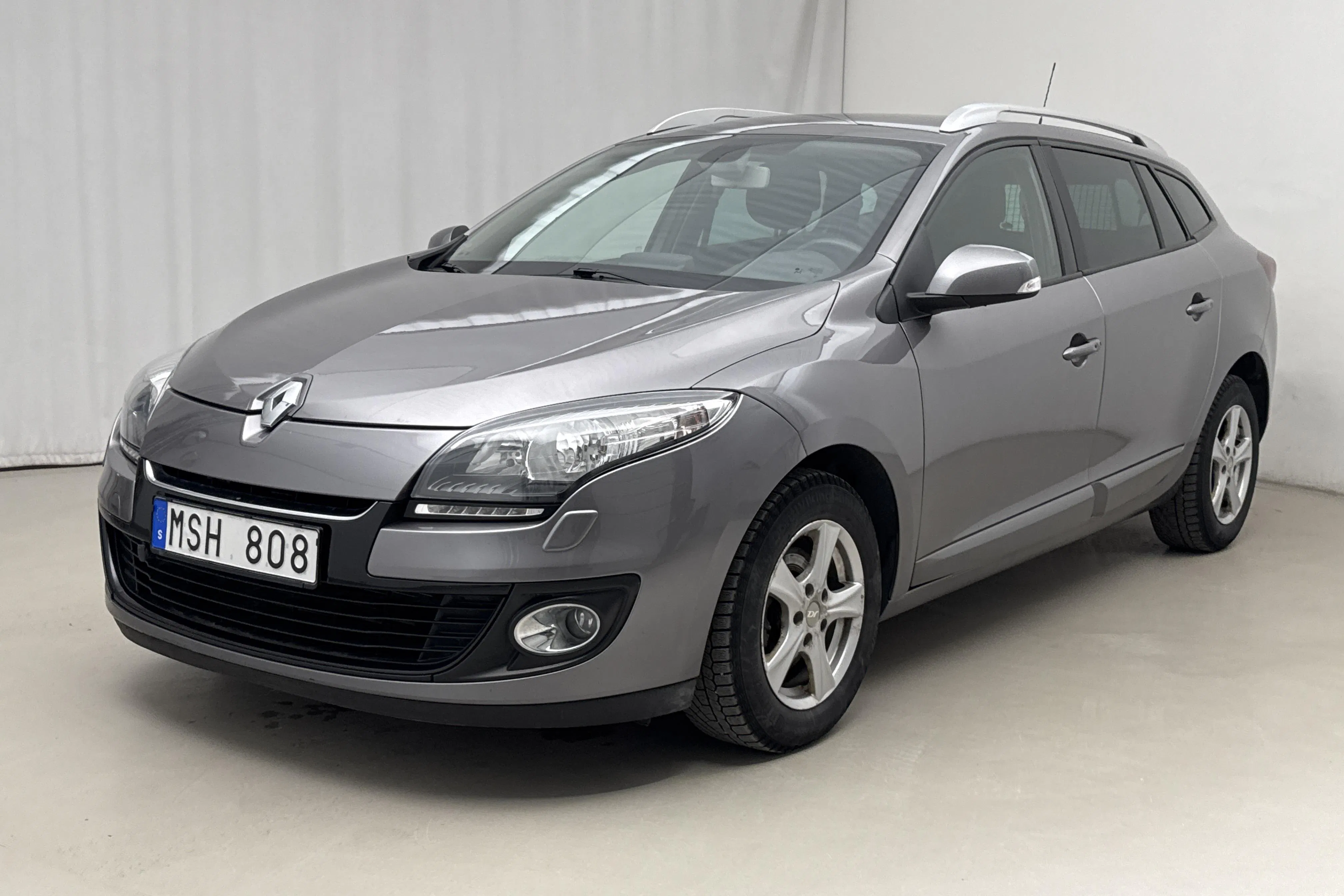 Presentationsfoto 1 av 13: Renault Mégane Phas III 1.5 dCi ESM Sports Tourer (110hk) - 11 232 mil - Manuell - grå - 2012
