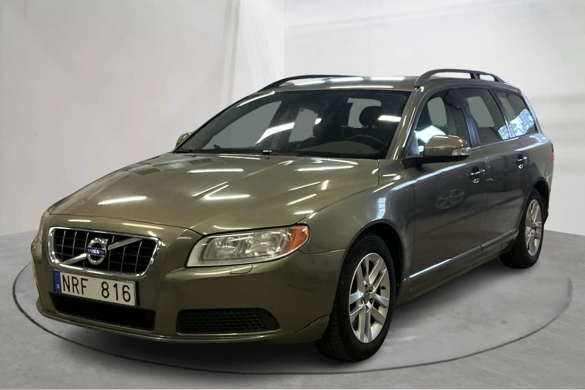 Presentationsfoto 1 av 14: Volvo V70 II 1.6D DRIVe (109hk) - 13 281 mil - Manuell - grön - 2011