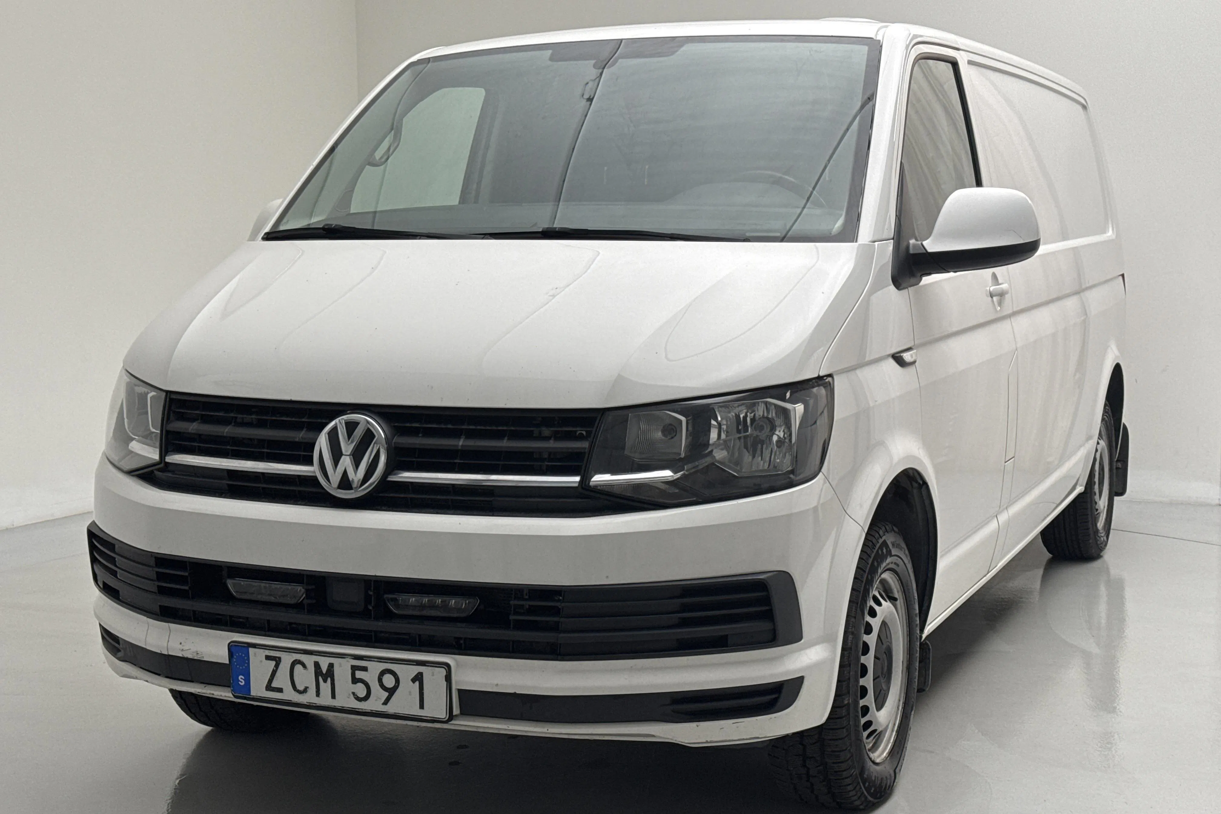 Presentation photo 1 of 14: VW Transporter T6 2.0 TDI BMT Skåp (150hk) - 197 380 km - Automatic - white - 2018