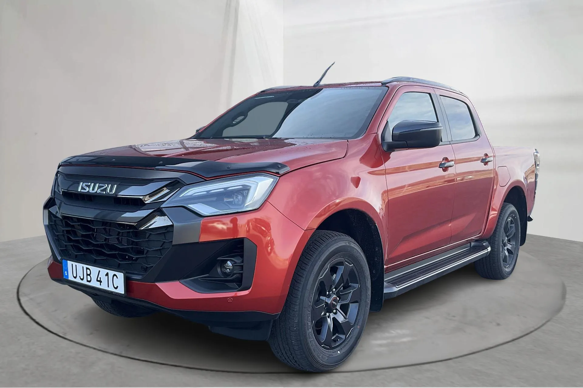 Presentationsfoto 1 av 14: Isuzu D-MAX 1.9 DDI CNG 4WD (164hk) - 3 mil - Automat - orange - 2024