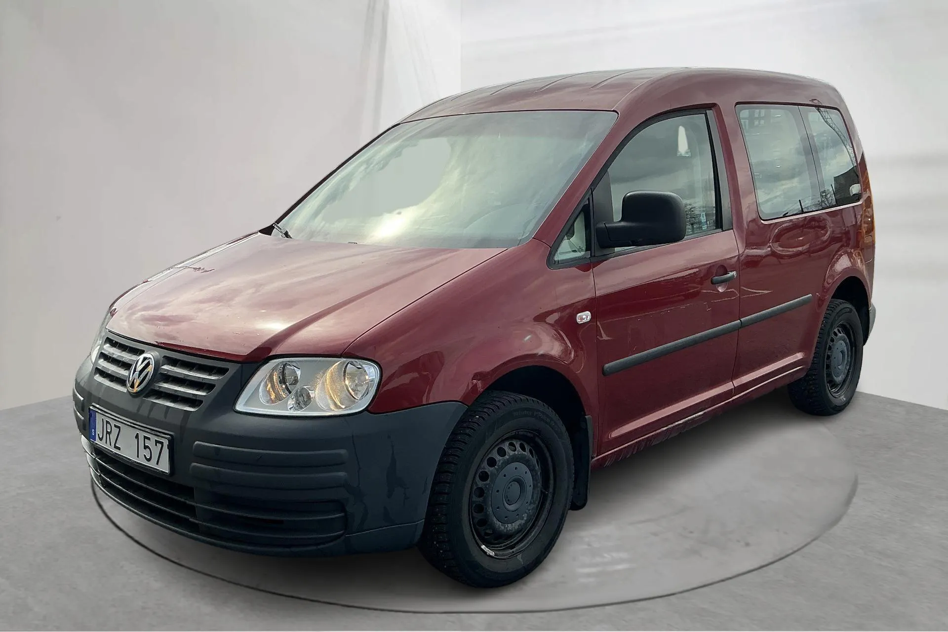 Presentation photo 1 of 12: VW Caddy Life 1.9 TDI (105hk) - 130 210 km - Manual - Dark Red - 2009