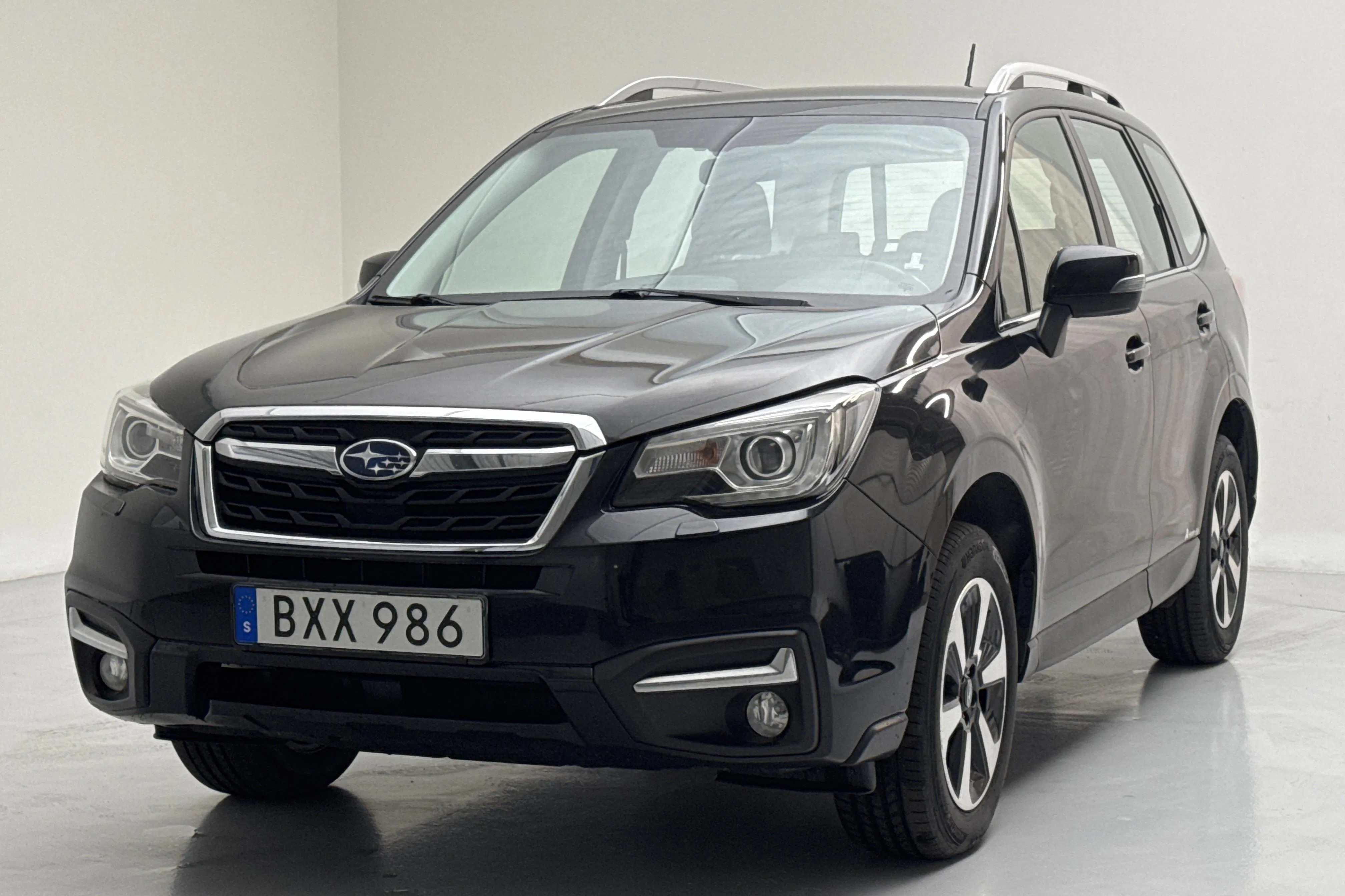 Presentation photo 1 of 14: Subaru Forester 2.0D (147hk) - 240 950 km - Automatic - black - 2016