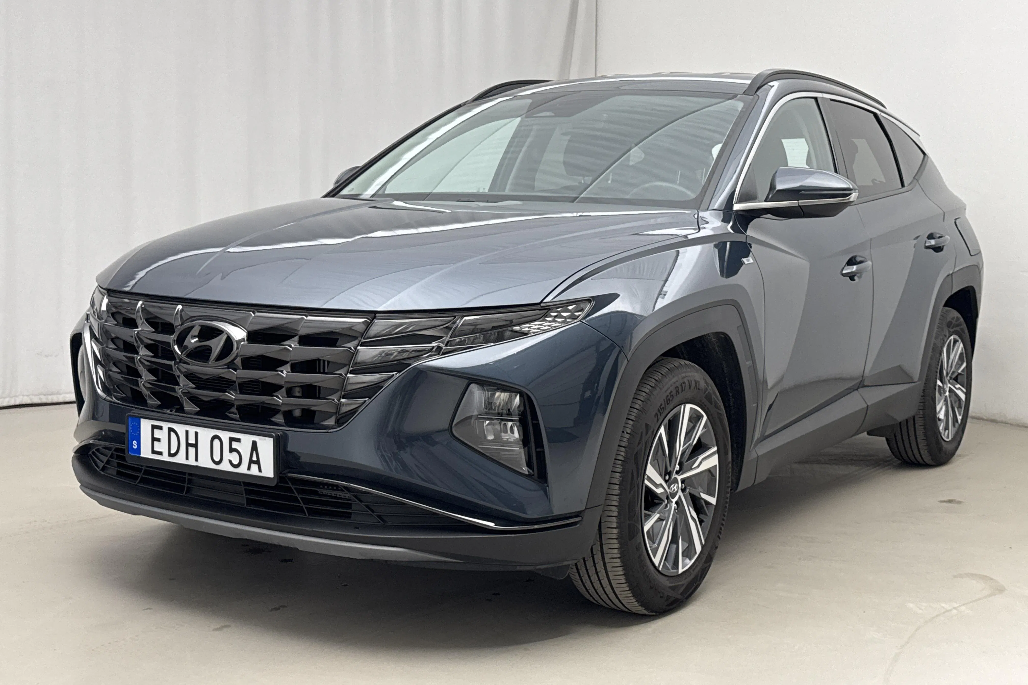 Presentationsfoto 1 av 18: Hyundai Tucson 1.6 T-GDi (150hk) - 2 353 mil - Automat - Dark Blue - 2023