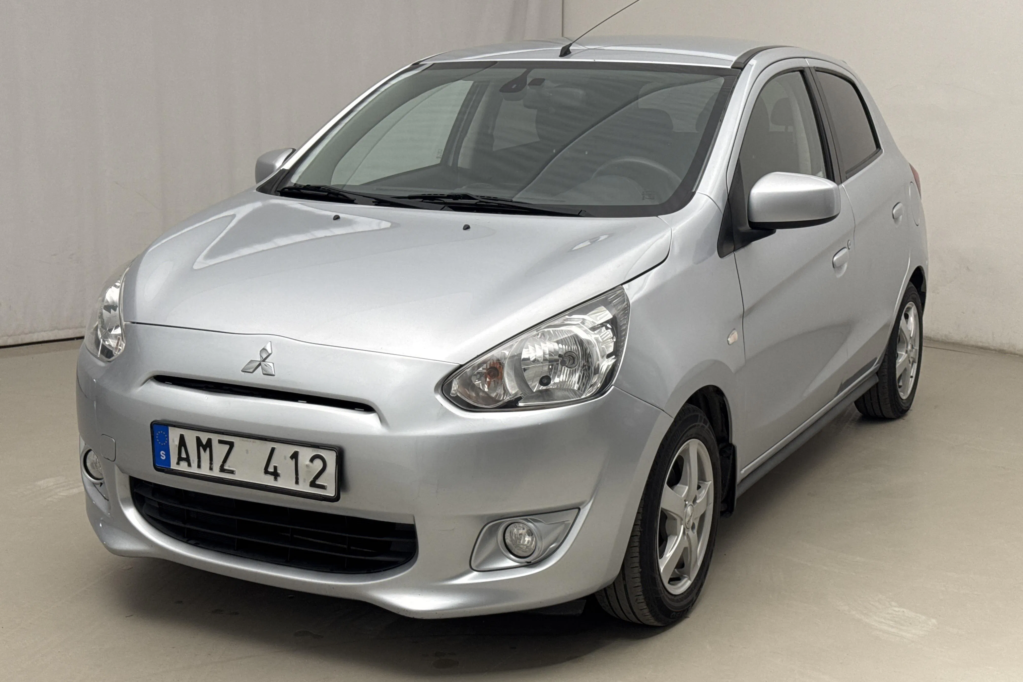 Presentation photo 1 of 14: Mitsubishi Space Star 1.2 5dr (80hk) - 86 000 km - Manual - silver - 2013