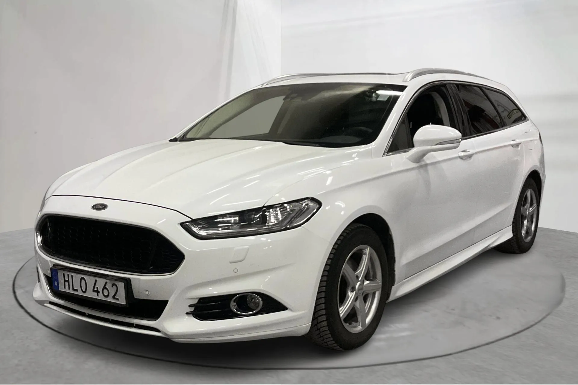 Presentationsfoto 1 av 19: Ford Mondeo 2.0 TDCi Kombi (180hk) - 25 722 mil - Automat - vit - 2015
