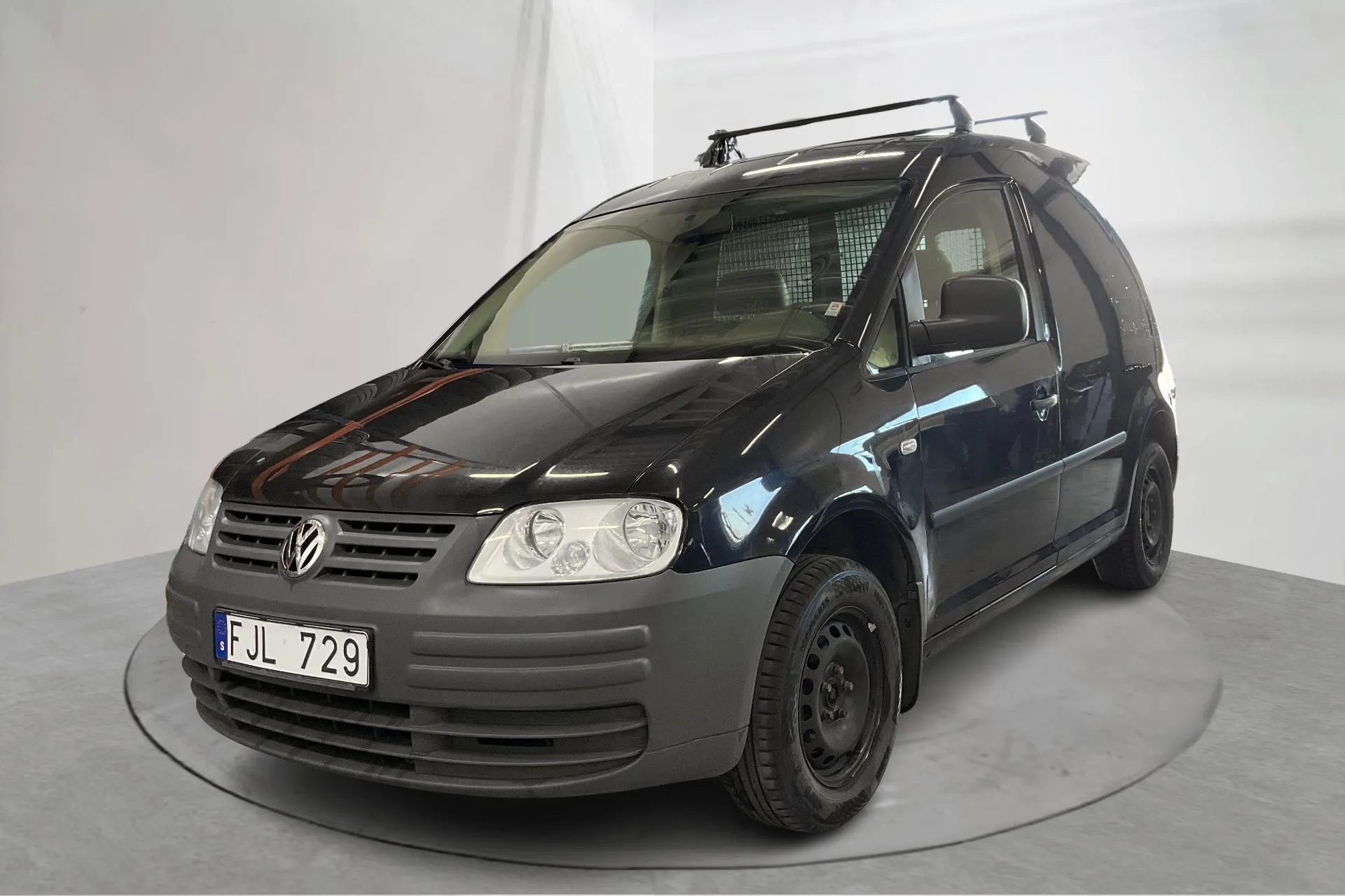 Presentationsfoto 1 av 14: VW Caddy 1.4 Skåp (80hk) - 16 662 mil - Manuell - svart - 2010