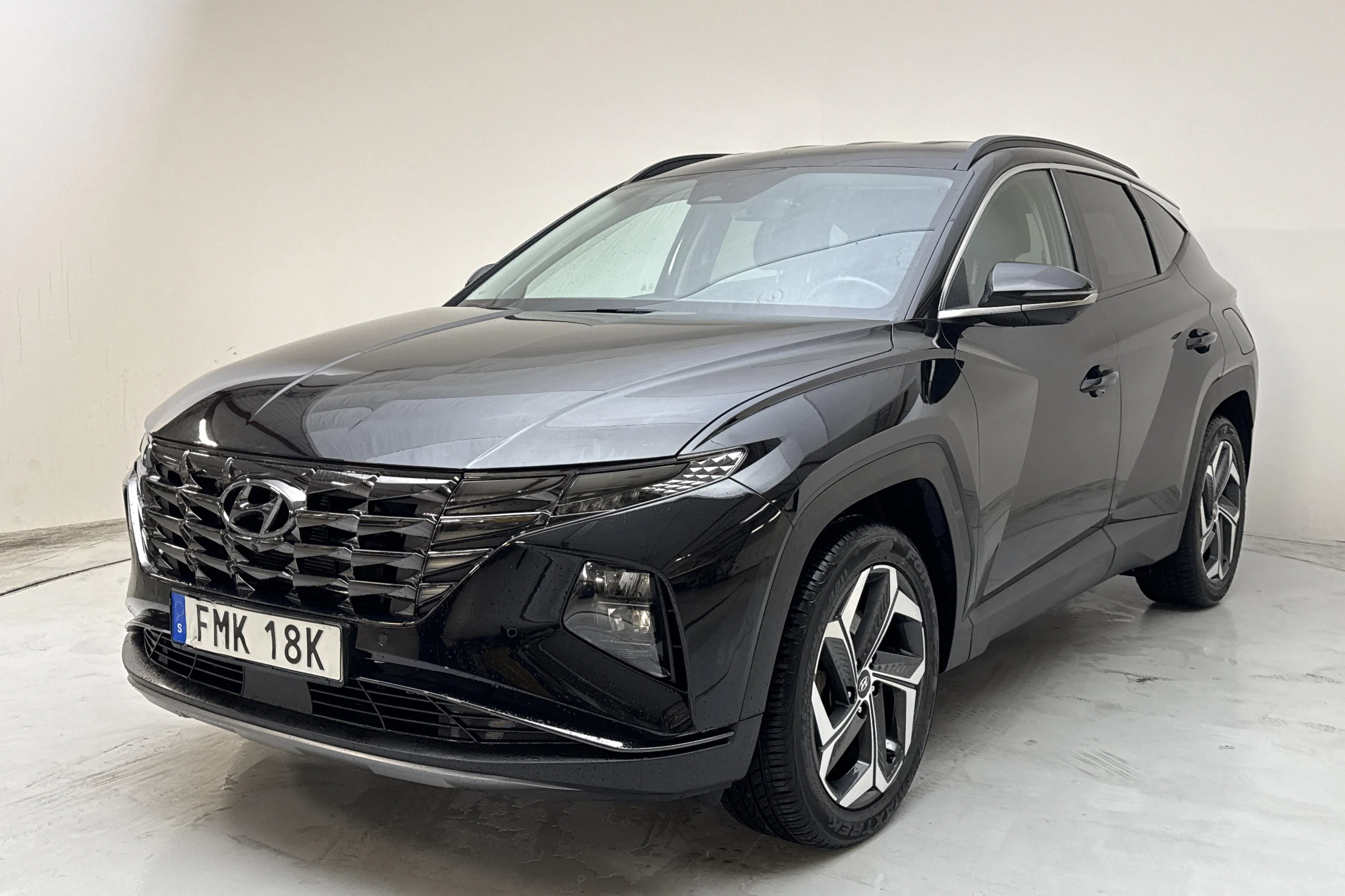 Presentationsfoto 1 av 16: Hyundai Tucson 1.6 GDI plug-in hybrid 4WD (265hk) - 7 210 mil - Automat - svart - 2022