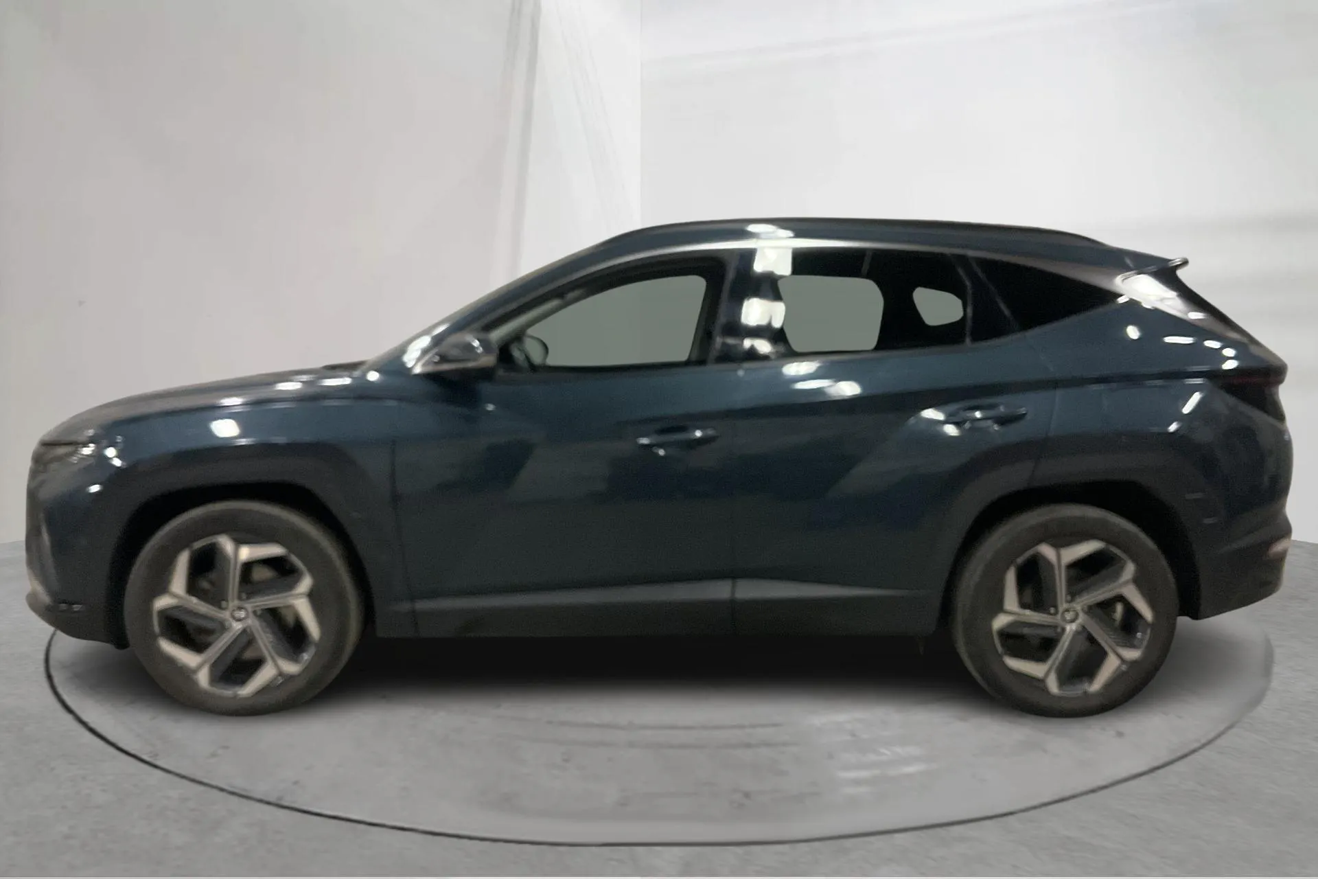 Presentationsfoto 2 av 19: Hyundai Tucson 1.6 GDI Hybrid 4WD (230hk) - 7 218 mil - Automat - blå - 2022