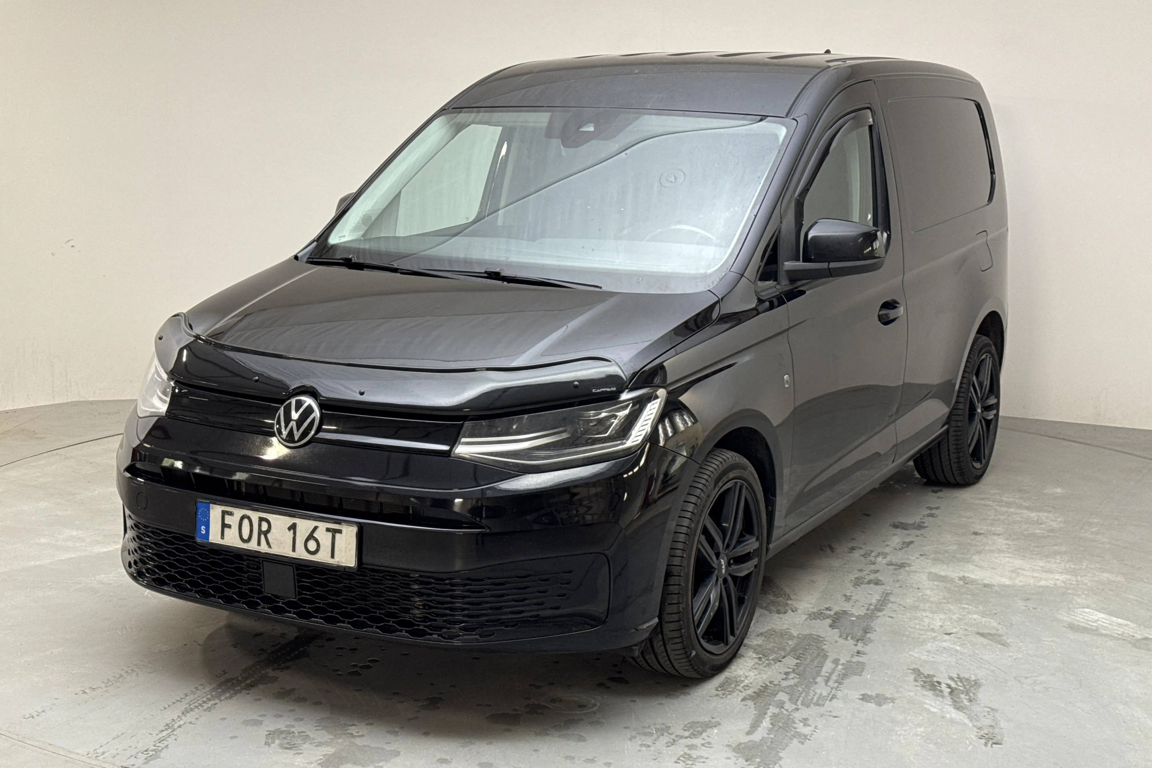 Presentationsfoto 1 av 9: VW Caddy Cargo 2.0 TDI Skåp (122hk) - 26 283 mil - Automat - svart - 2021