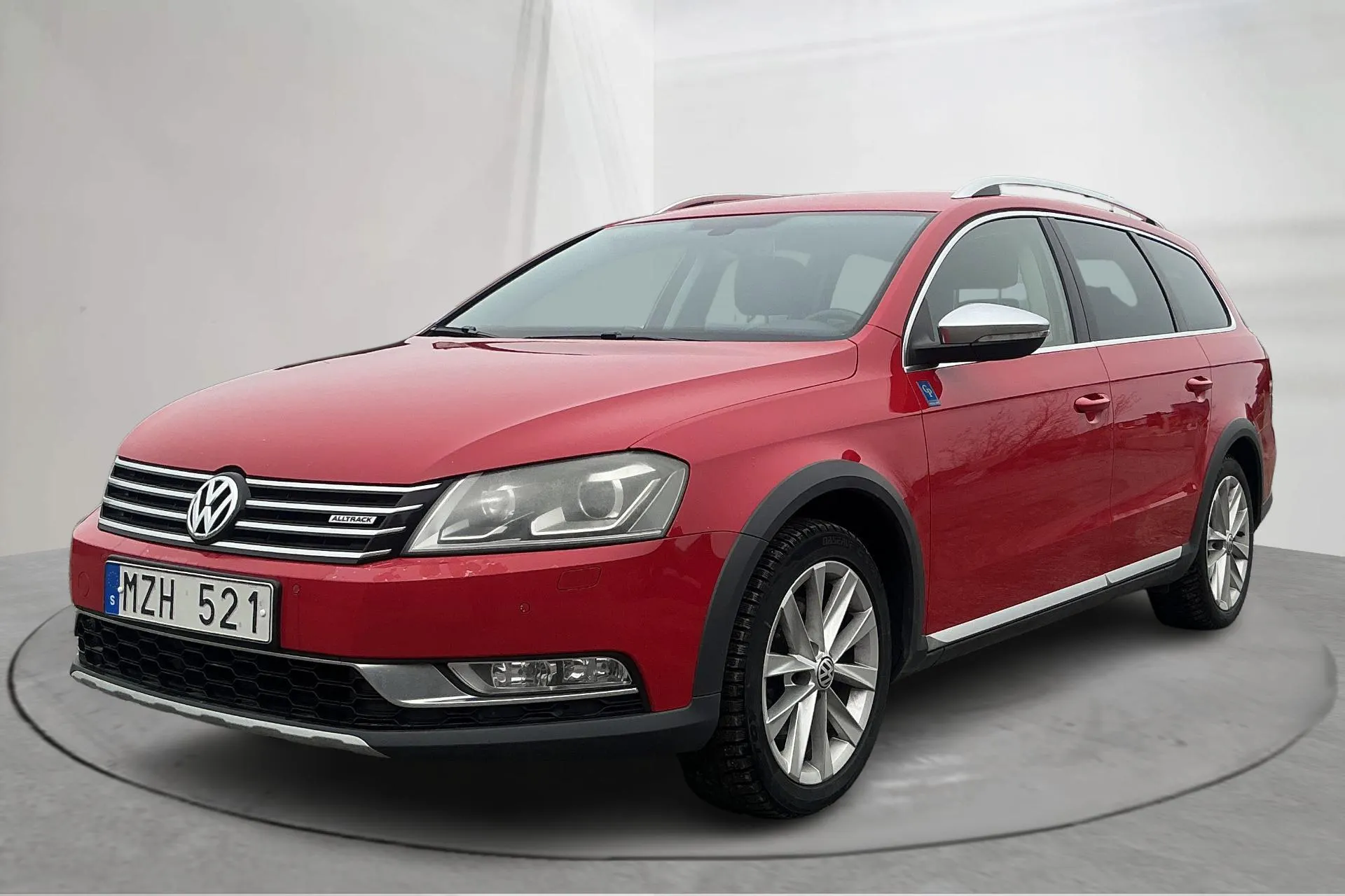 Presentationsfoto 1 av 14: VW Passat Alltrack 2.0 TDI BlueMotion Technology 4Motion (170hk) - 25 256 mil - Automat - röd - 2013