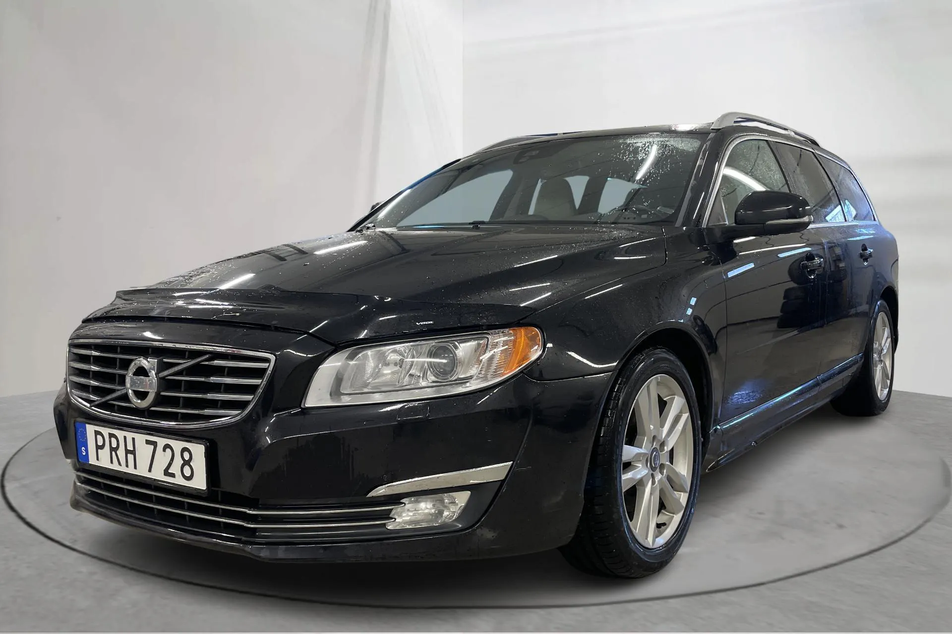 Presentationsfoto 1 av 15: Volvo V70 II D4 (181hk) - 19 503 mil - Automat - svart - 2014