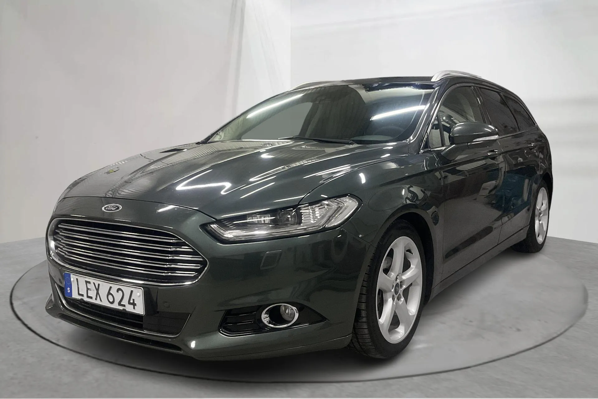 Presentationsfoto 1 av 14: Ford Mondeo 2.0 TDCi Kombi (210hk) - 20 235 mil - Automat - grön - 2016
