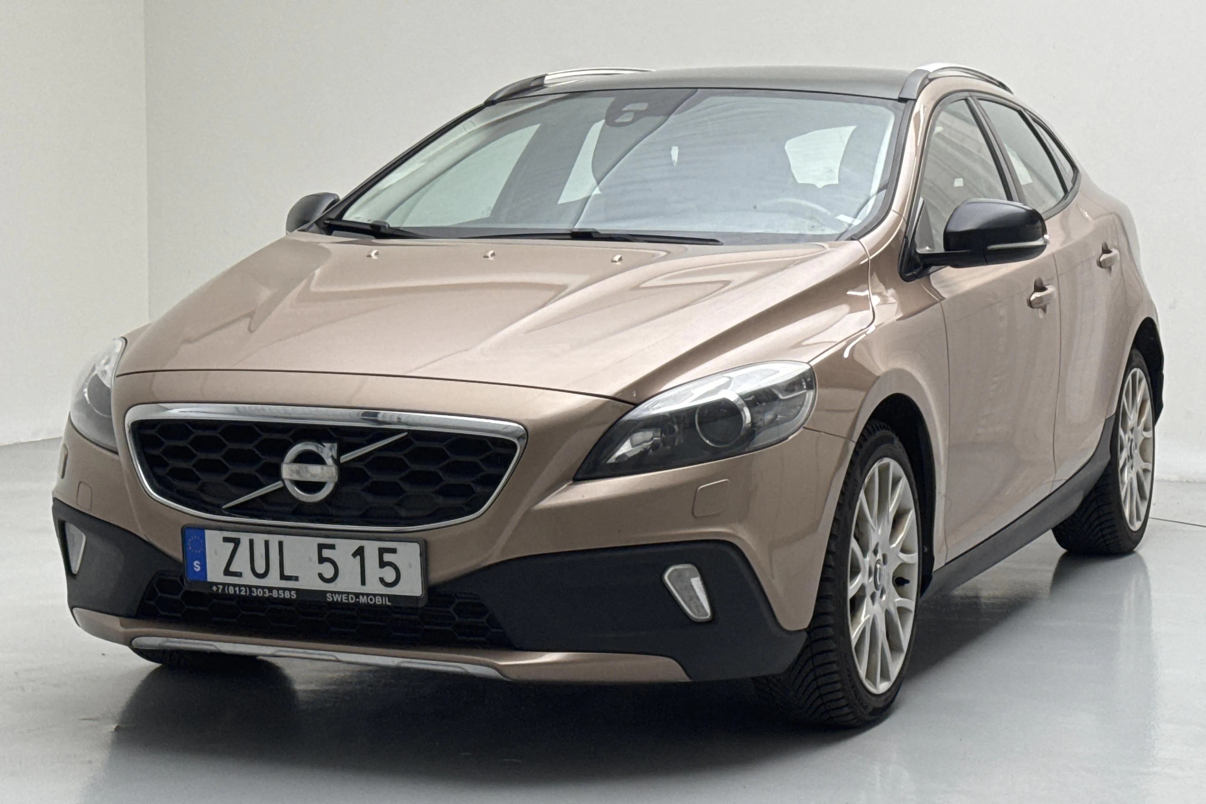 Presentationsfoto 1 av 14: Volvo V40 Cross Country D2 (115hk) - 13 826 mil - Automat - brun - 2013