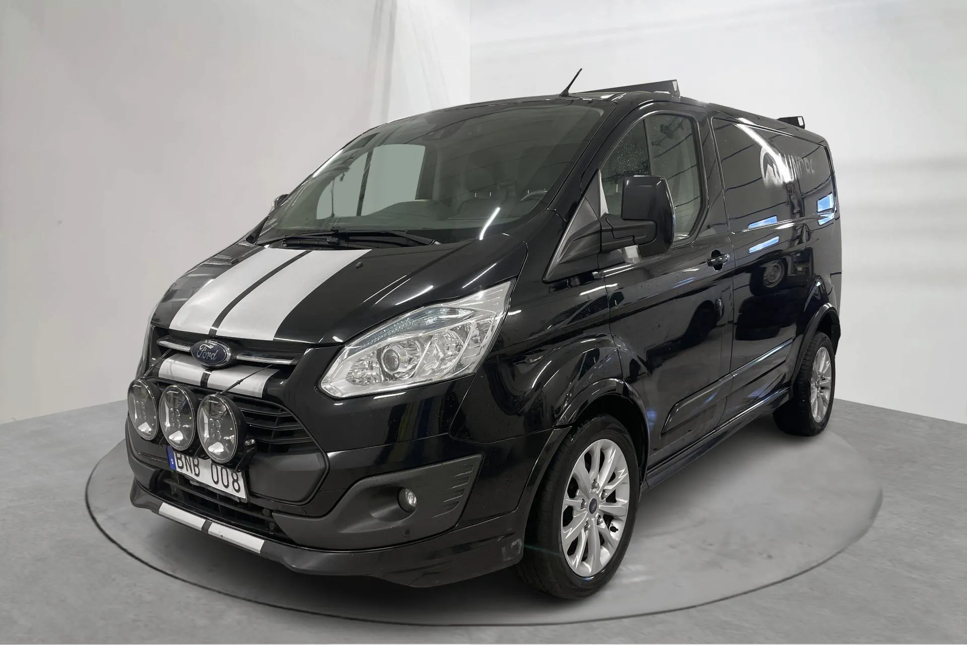Presentationsfoto 1 av 16: Ford Transit Custom 290 SportVan (155hk) - 18 318 mil - Manuell - svart - 2013