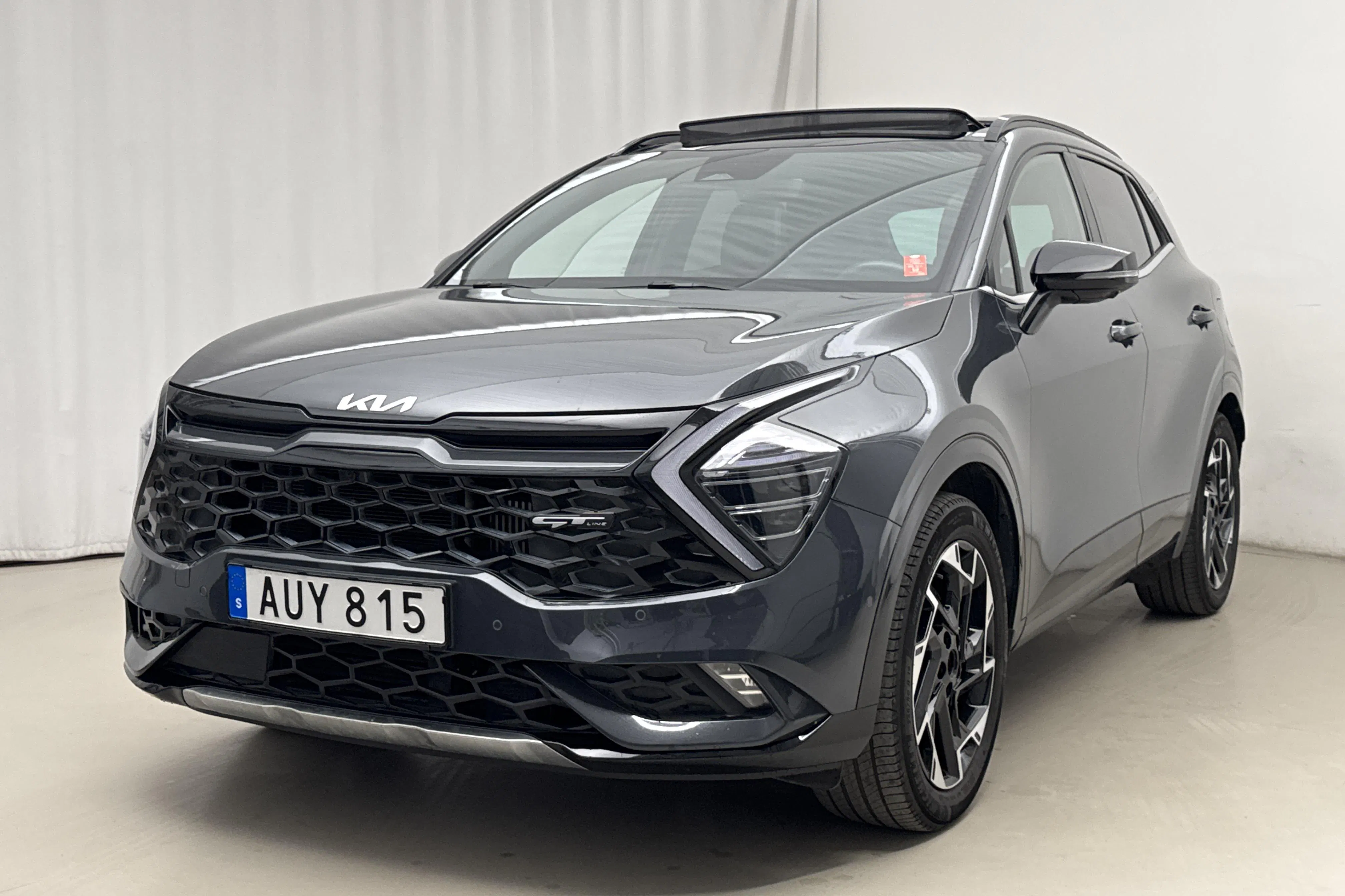 Presentationsfoto 1 av 22: KIA Sportage PHEV AWD (265hk) - 7 549 mil - Automat - grå - 2022
