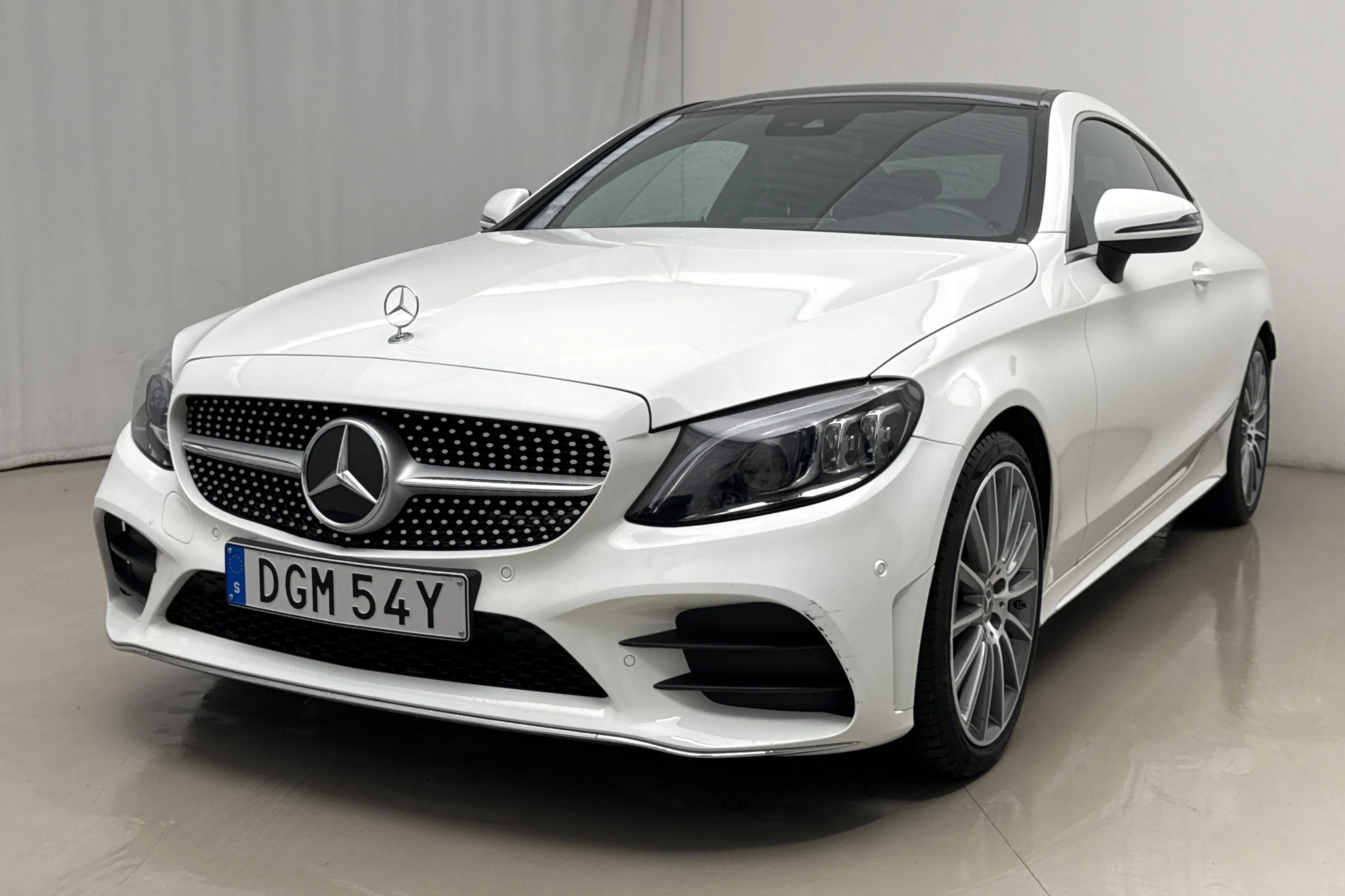 Presentation photo 1 of 22: Mercedes C 200 Coupé C205 (184hk) - 44 560 km - Automatic - white - 2021