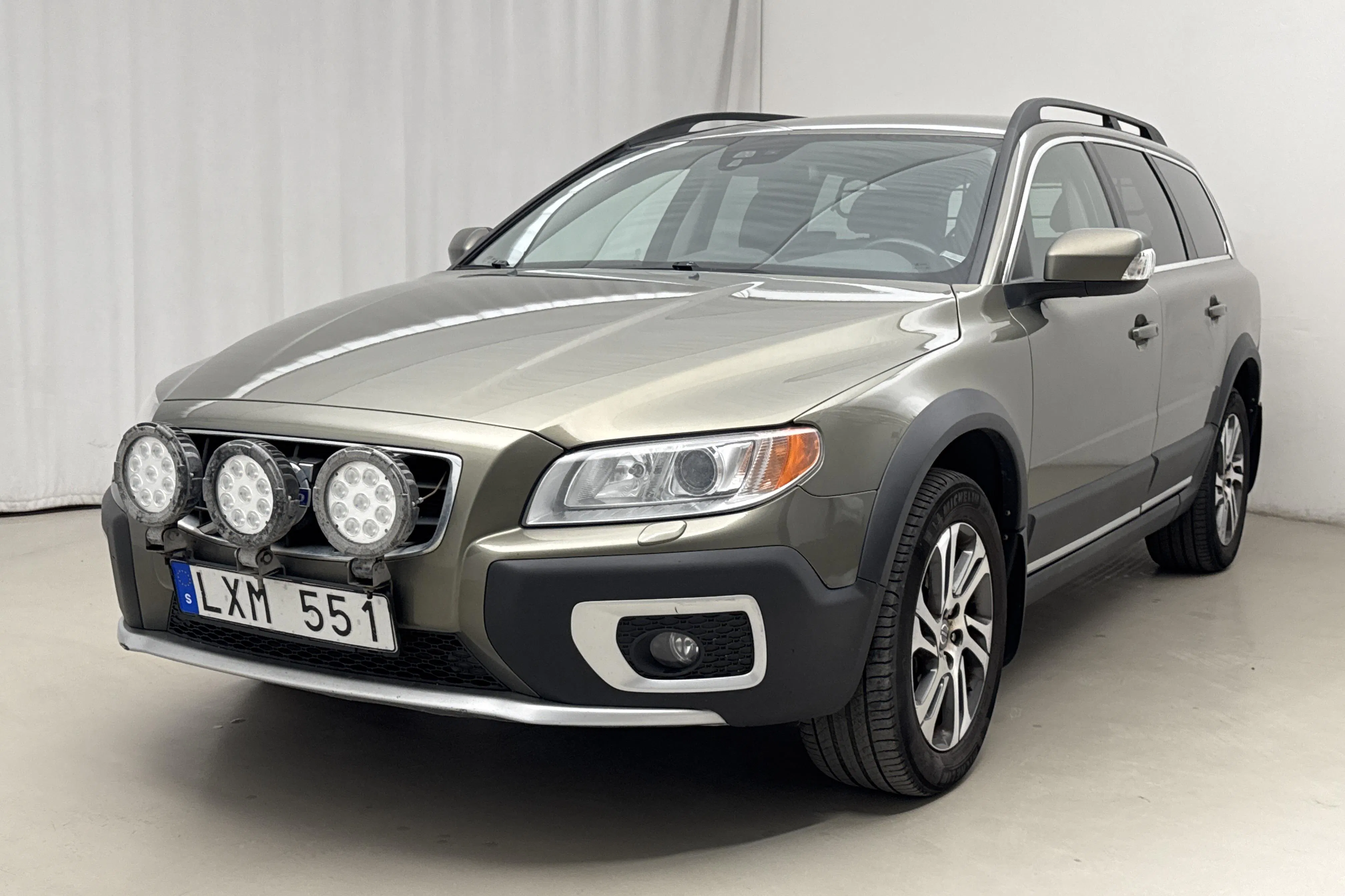 Presentationsfoto 1 av 16: Volvo XC70 II D5 AWD (215hk) - 27 301 mil - Automat - grön - 2012