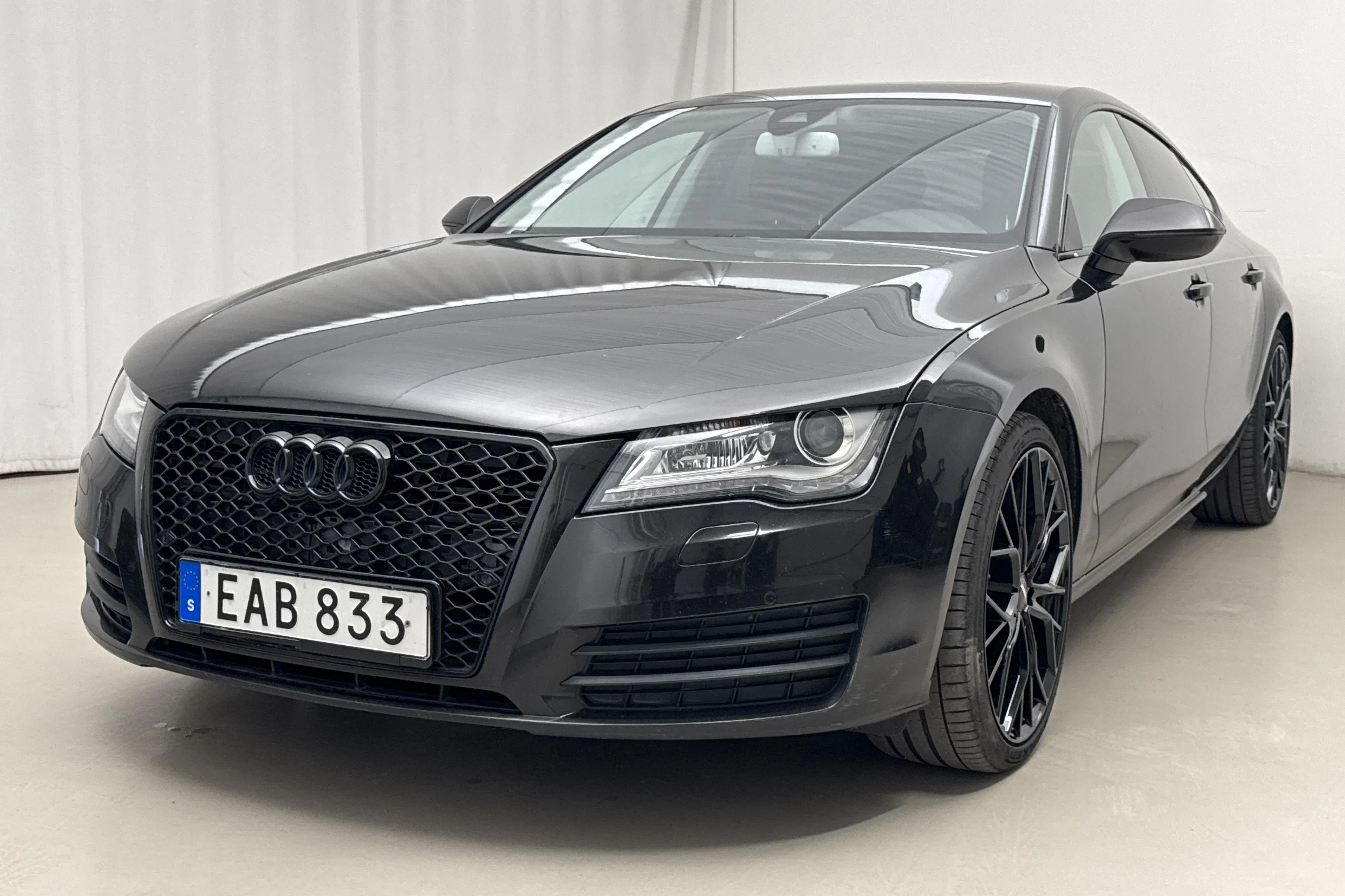 Presentationsfoto 1 av 22: Audi A7 3.0 TDI Sportback quattro (245hk) - 19 678 mil - Automat - svart - 2011