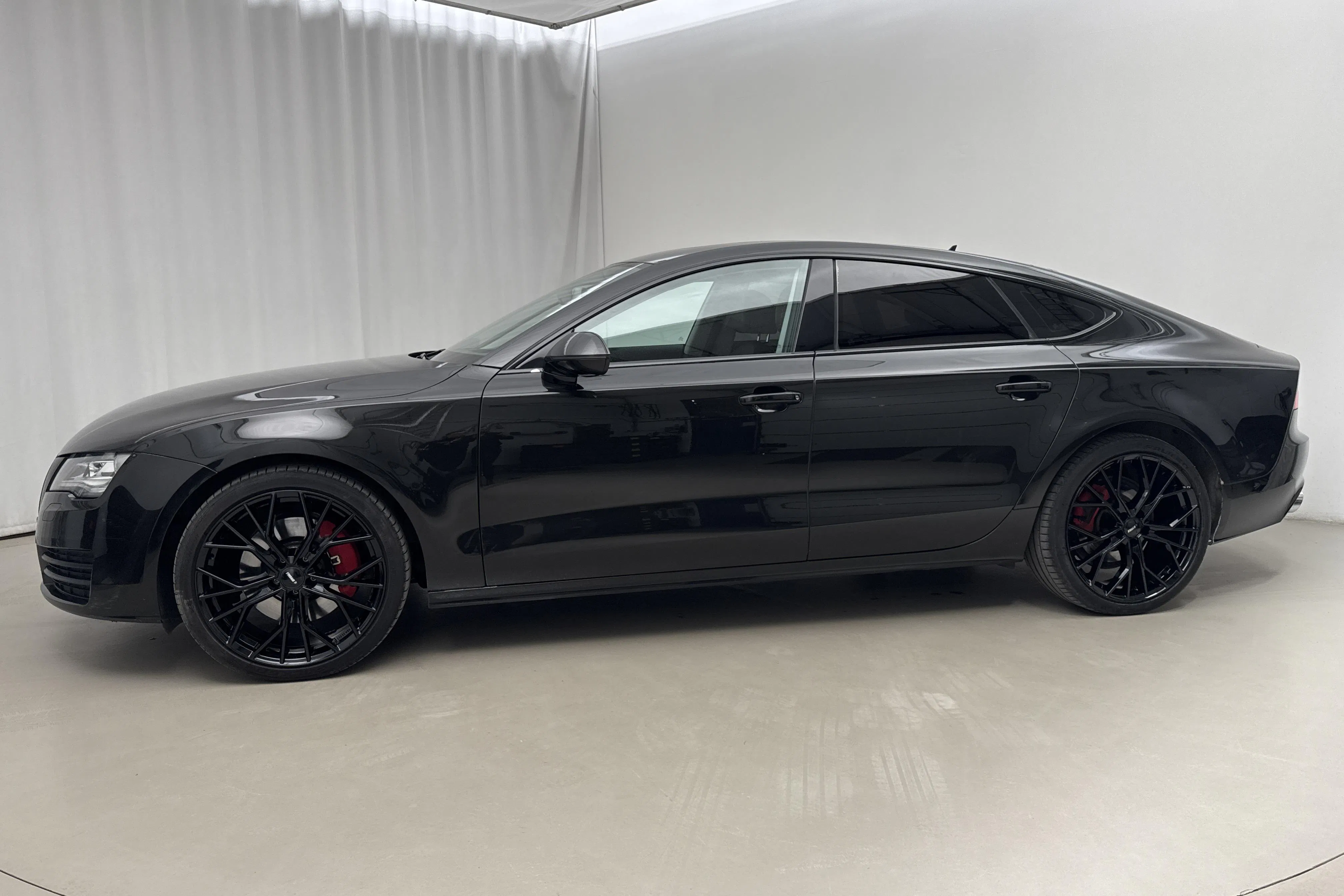 Presentationsfoto 2 av 22: Audi A7 3.0 TDI Sportback quattro (245hk) - 19 678 mil - Automat - svart - 2011