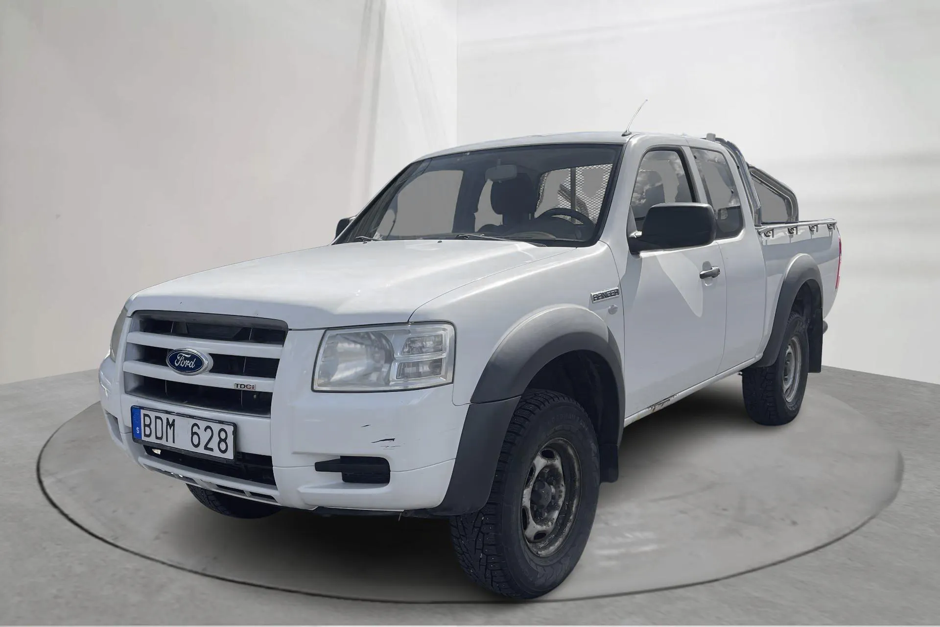 Presentationsfoto 1 av 13: Ford Ranger 2.5 TDCi 4WD (143hk) - 13 802 mil - Manuell - vit - 2009