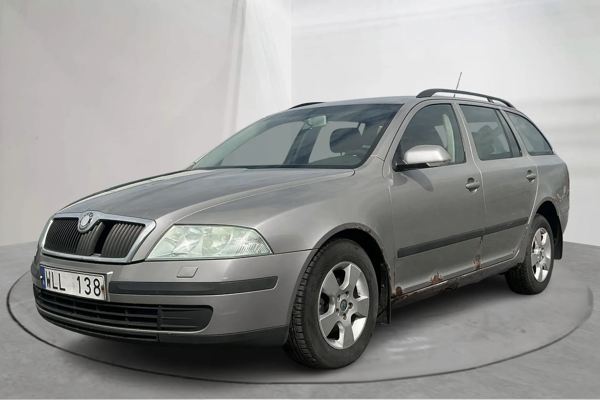Presentation photo 1 of 15: Skoda Octavia II 1.9 TDI Kombi 4X4 (105hk) - 291 650 km - Manual - Light Brown - 2007