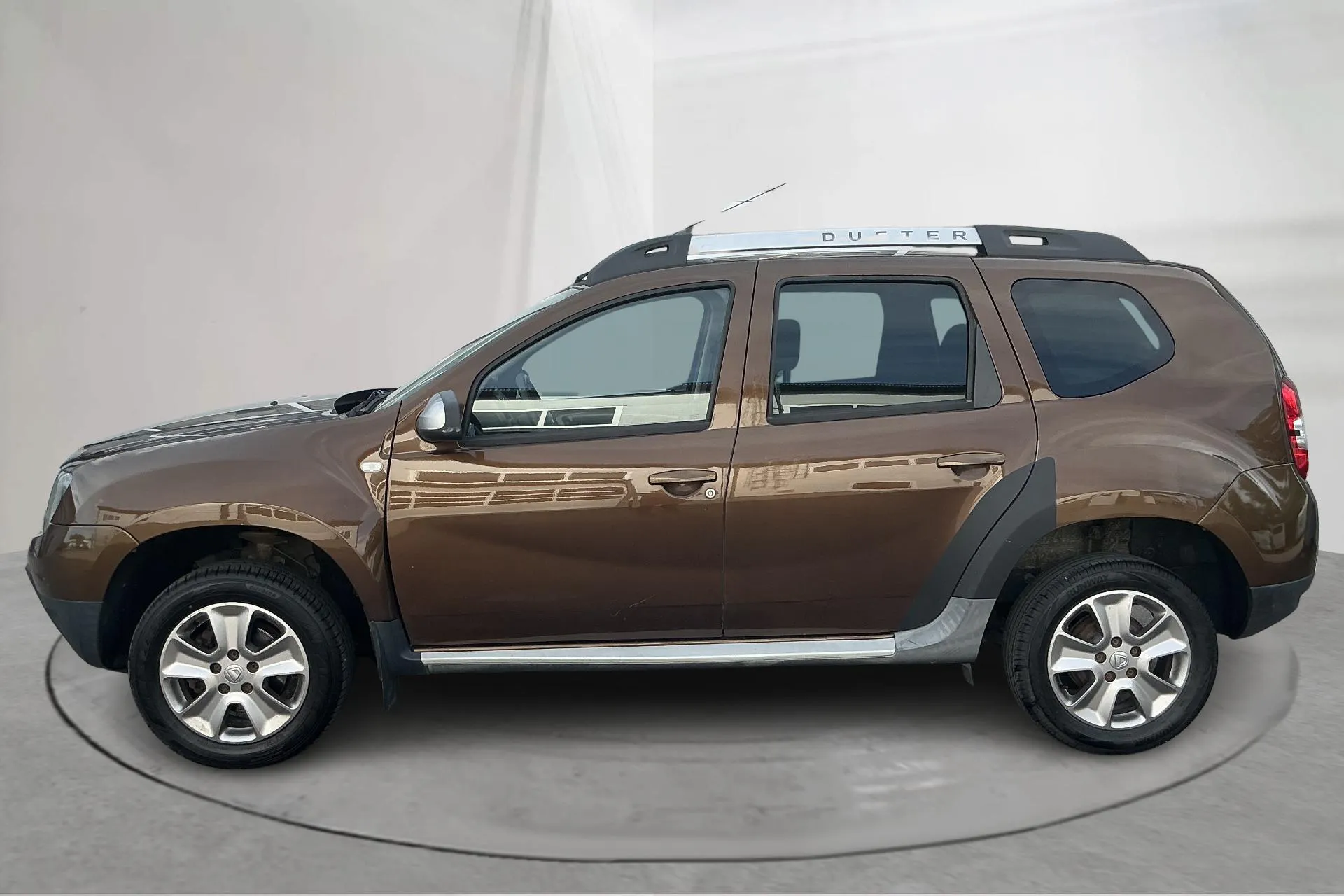 Presentation photo 2 of 14: Dacia Duster 1.5 dCi 4x4 (109hk) - 175 860 km - Manual - brown - 2014