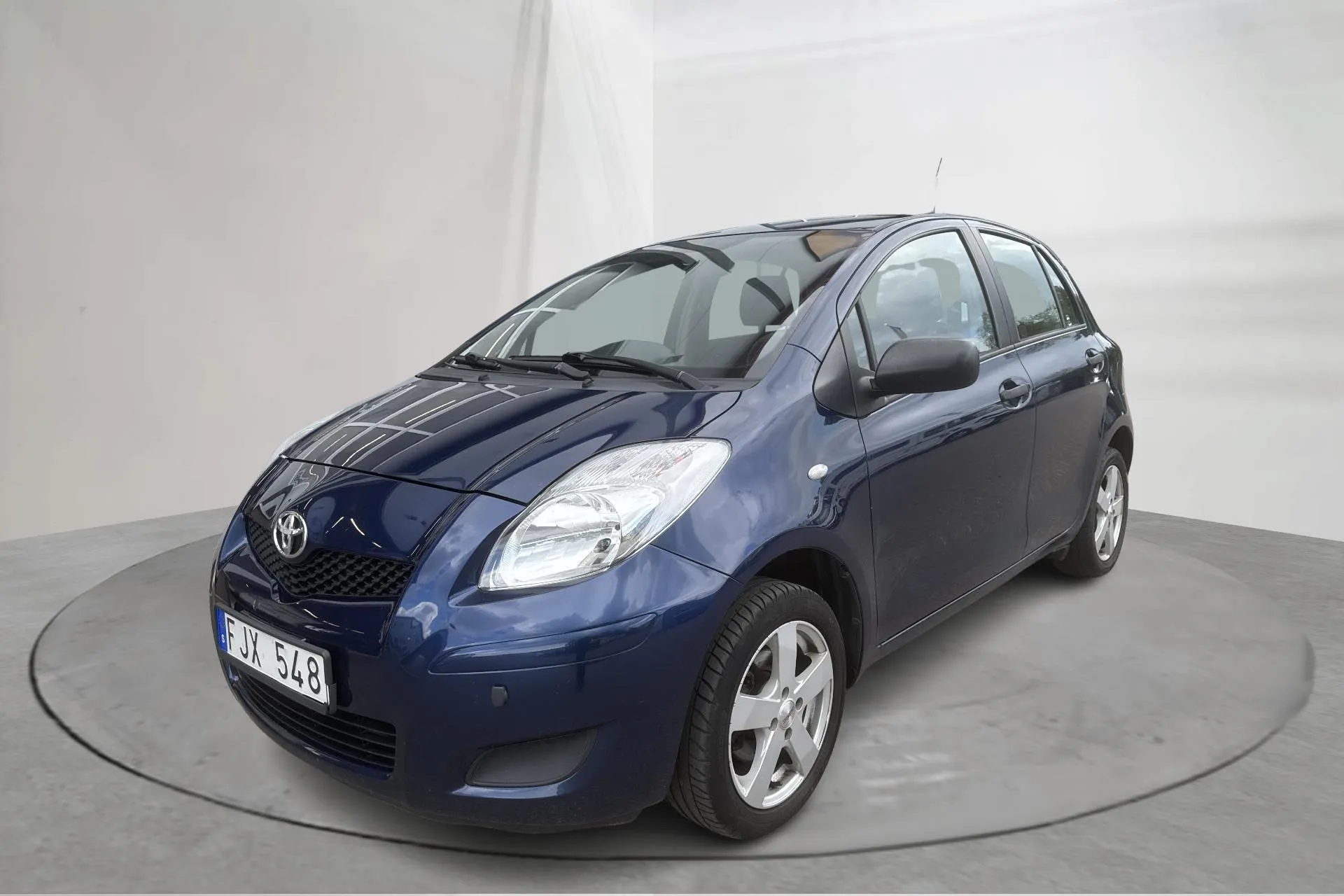 Presentation photo 1 of 15: Toyota Yaris 1.0 5dr (69hk) - 155 900 km - Manual - dark blue - 2009