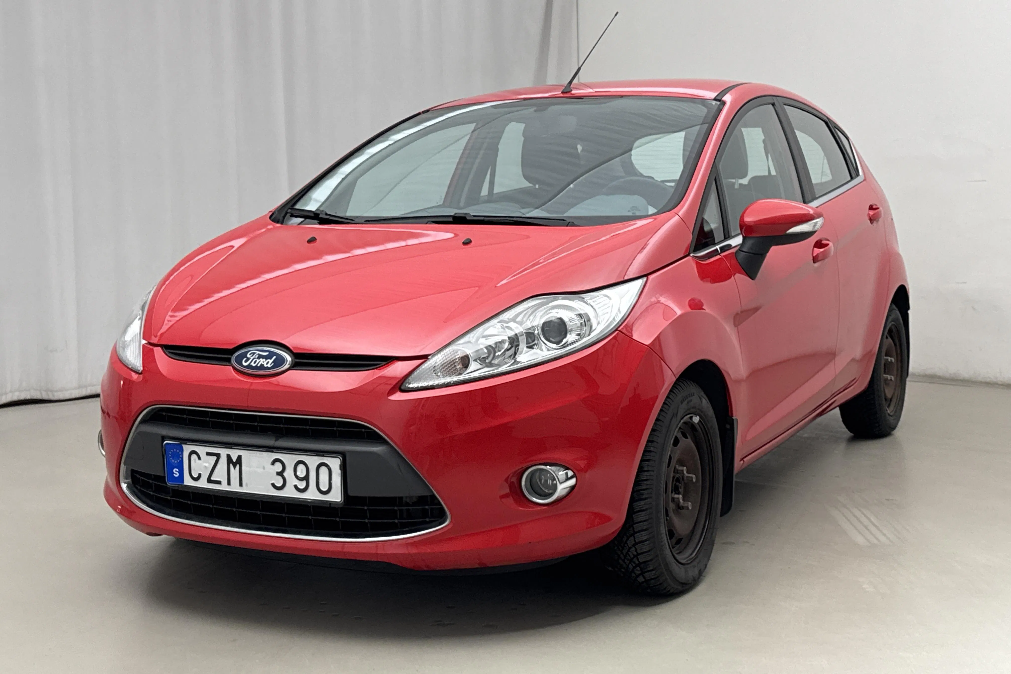 Presentation photo 1 of 15: Ford Fiesta 1.25 5dr (82hk) - 71 490 km - Manual - red - 2010