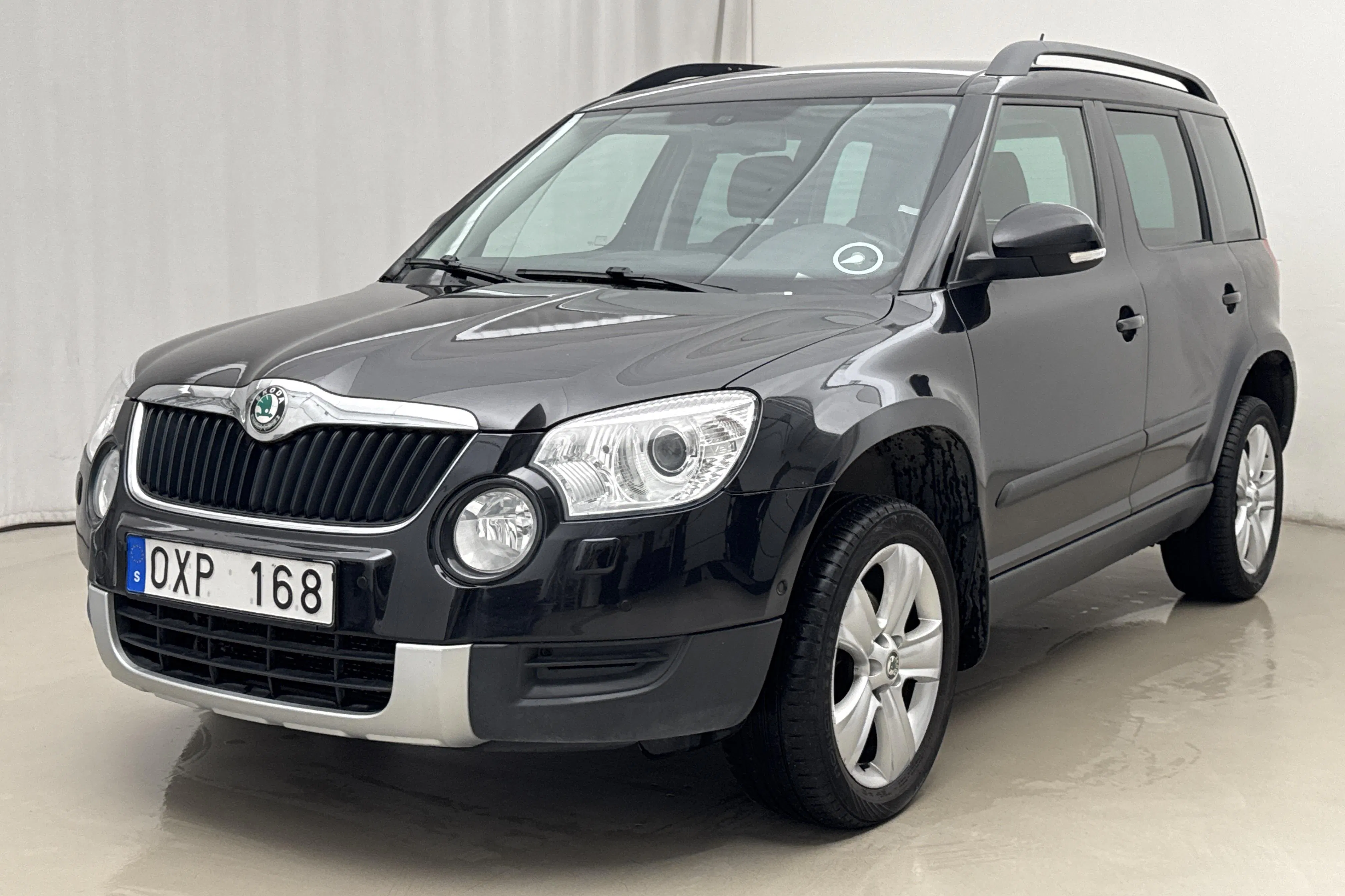 Presentationsfoto 1 av 17: Skodafhr790 Yeti 2.0 TDI CR 4X4 (140hk) - 20 360 mil - Automat - svart - 2013