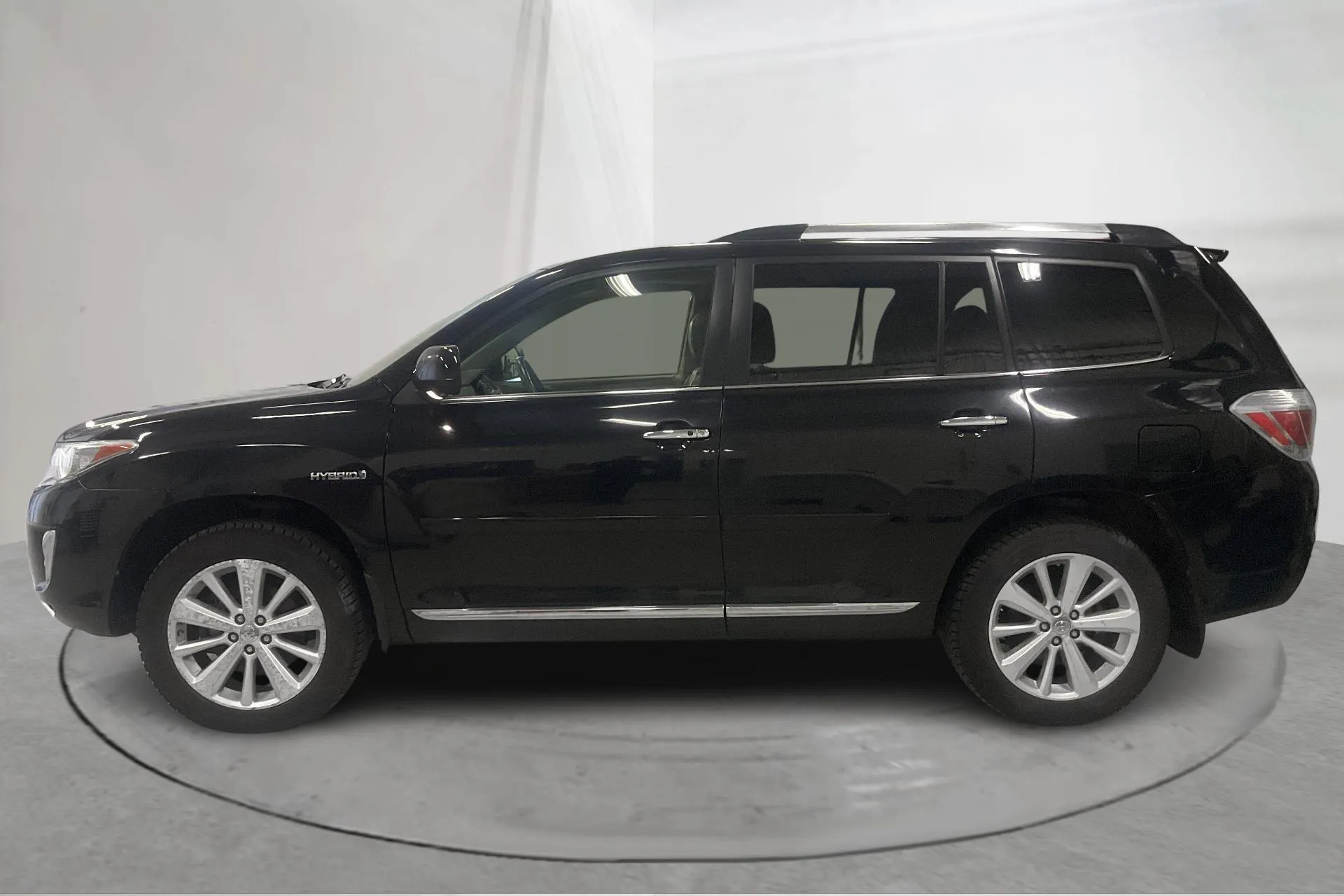 Presentationsfoto 2 av 20: Toyota Highlander 3.5 Hybrid AWD (248hk) - 21 065 mil - Manuell - svart - 2013