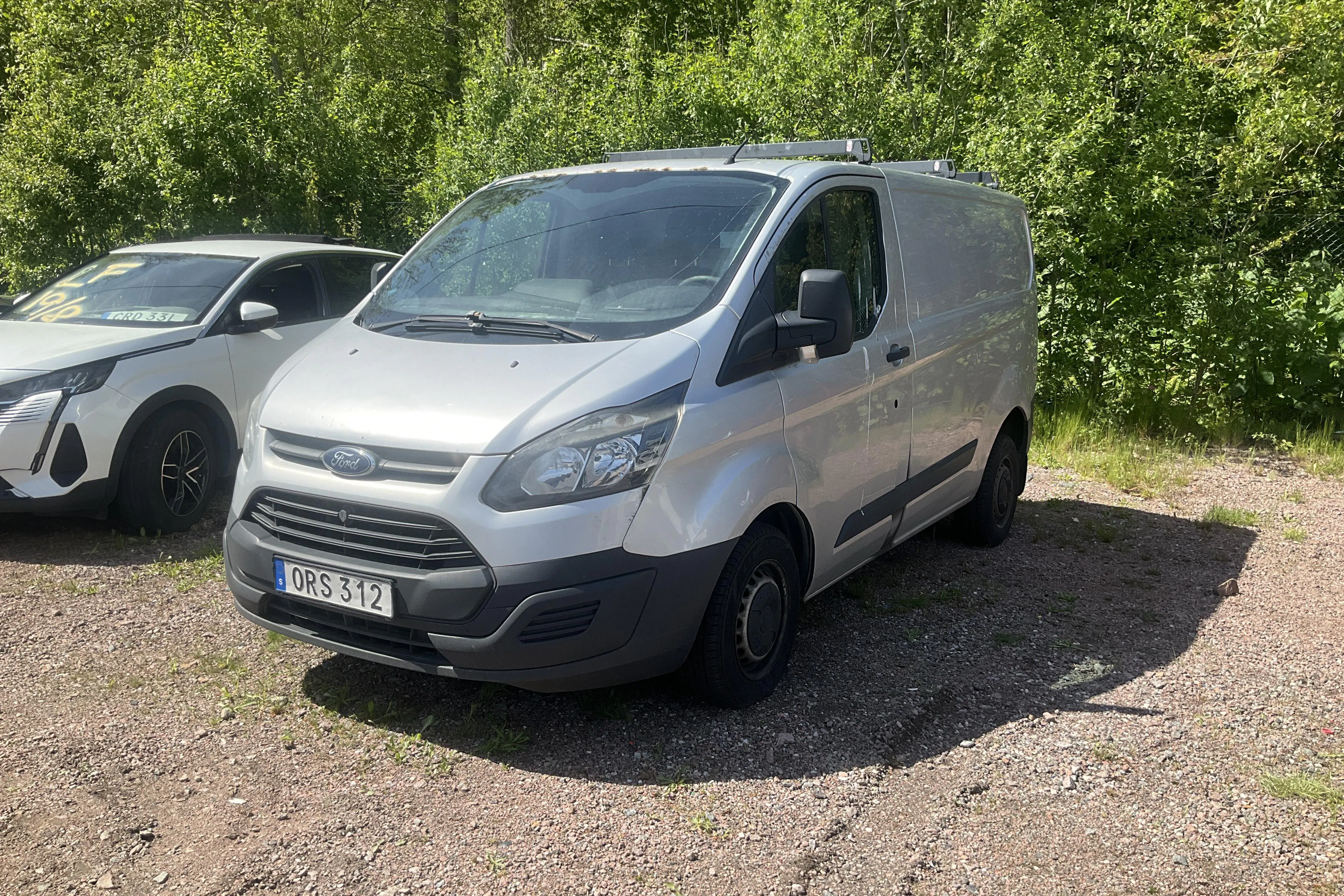 Presentation photo 1 of 13: Ford Transit Custom 270 (100hk) - 321 460 km - Manual - gray - 2014