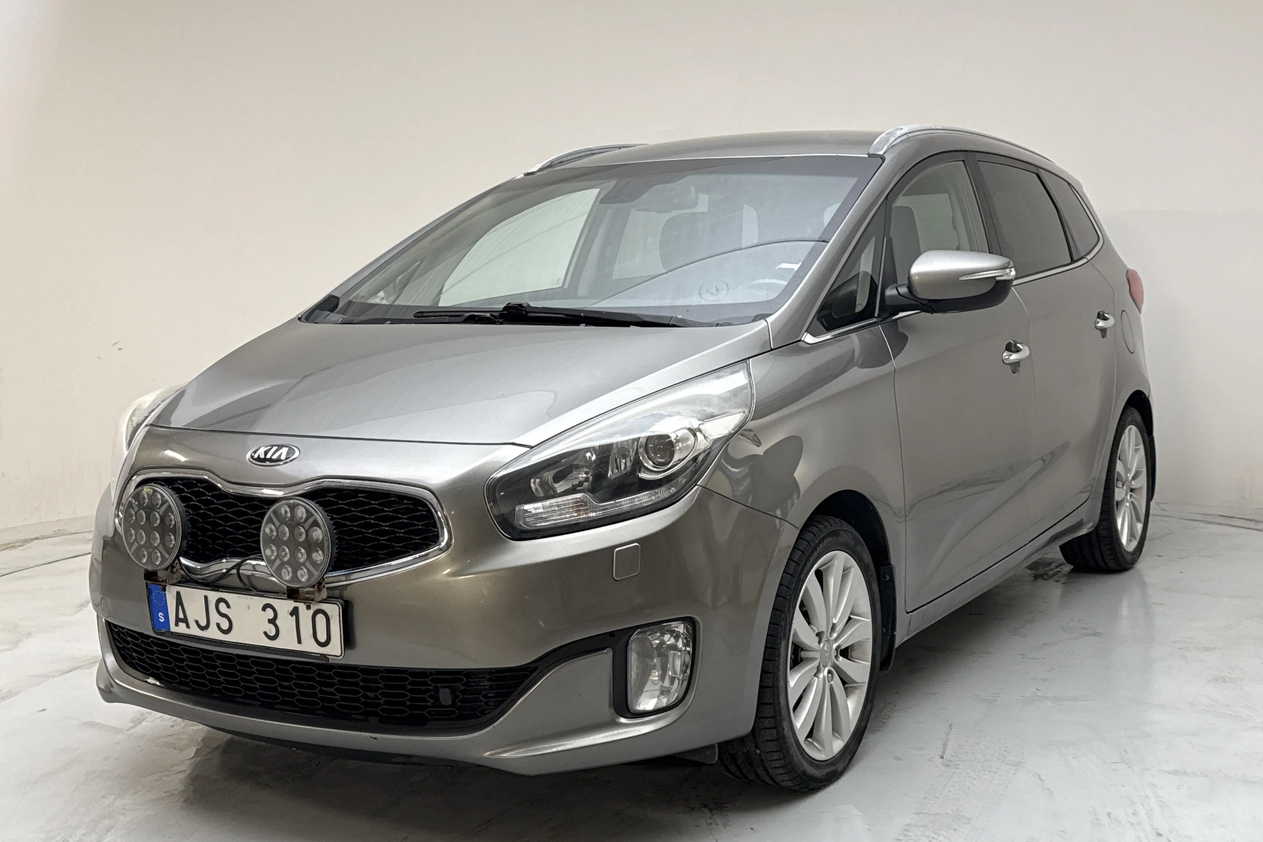 Presentation photo 1 of 13: KIA Carens 1.7 CRDi (115hk) - 253 020 km - Manual - gray - 2014